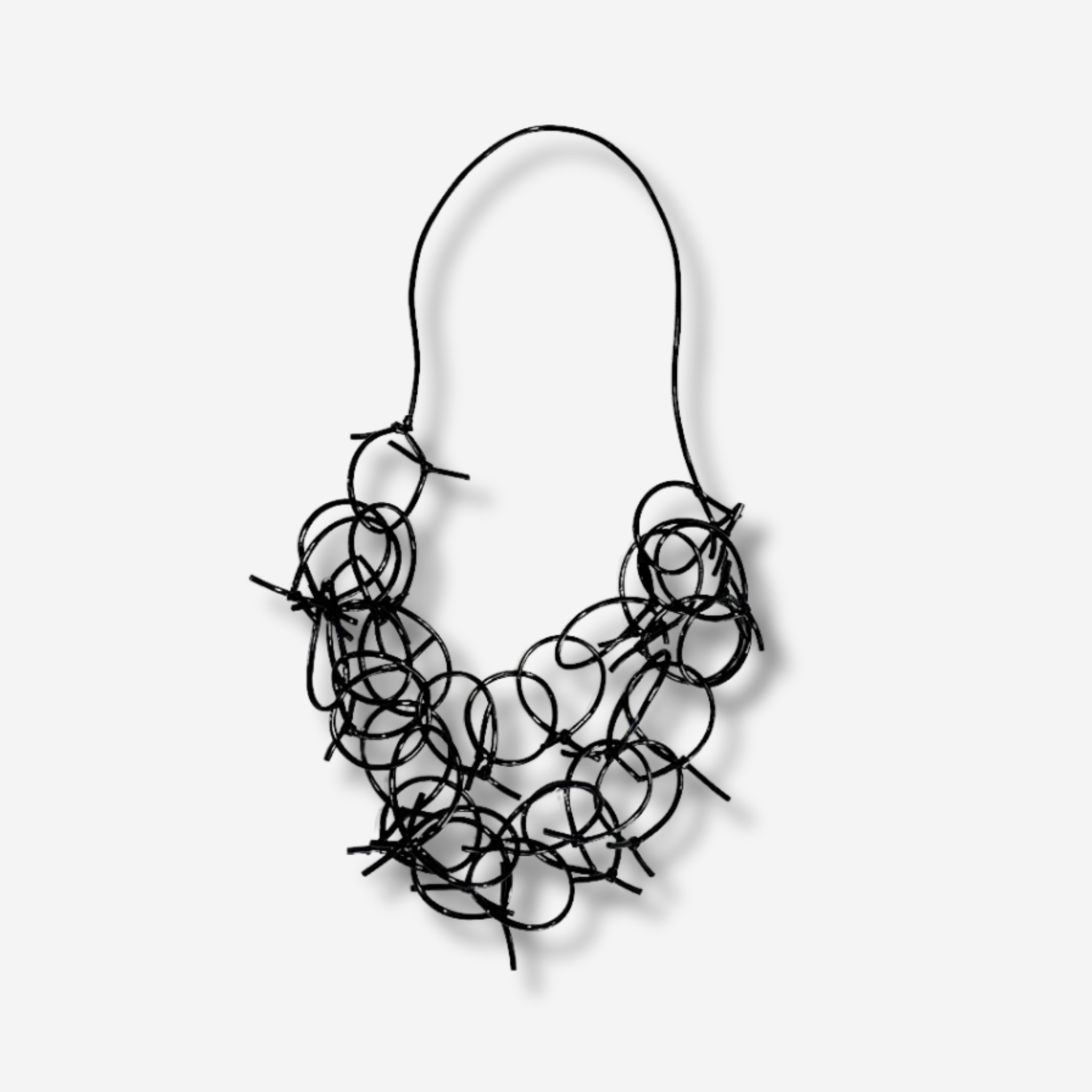 ‘Dua’ Ó RING Patent Rubber Neckpiece
