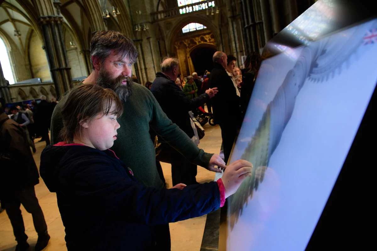 Father and daughter explore a gas turbine