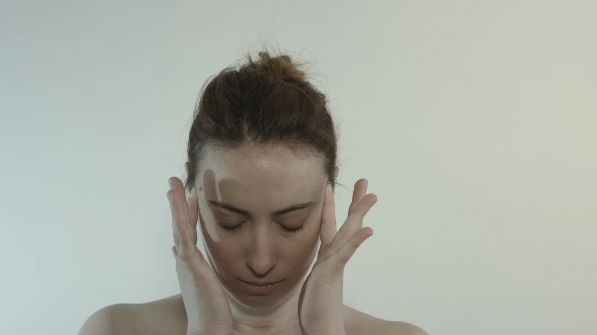 Elena Face Hands.jpg