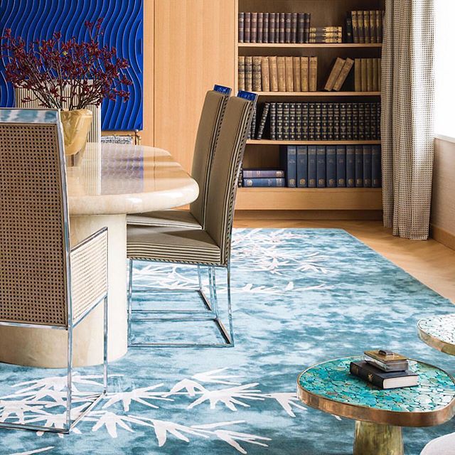 Beautiful combination of colors and shapes in this London apartment @irakliz. Shown @karlspringerltd Oval Dining Table in Natural Goatskin Parchment. Artwork by Marc Cavell. 
#midcenturymoderndesign #iraklizariainteriors #karlspringer #interiordesign