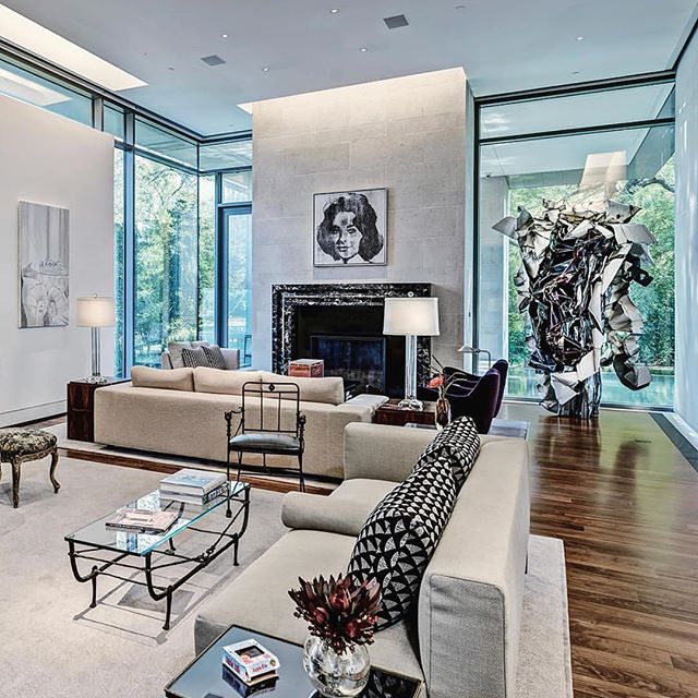 The living room in the modernist mansion of collectors Gayle and Paul Stoffel. Luc Tuymans&rsquo; &lsquo;Egypt&rsquo;(2003), Andy Warhol&rsquo;s &lsquo;Campbell Tomato Juice Box (1964) and &lsquo;Silver Liz&rsquo; (1963) and John Chamberlain&rsquo;s 