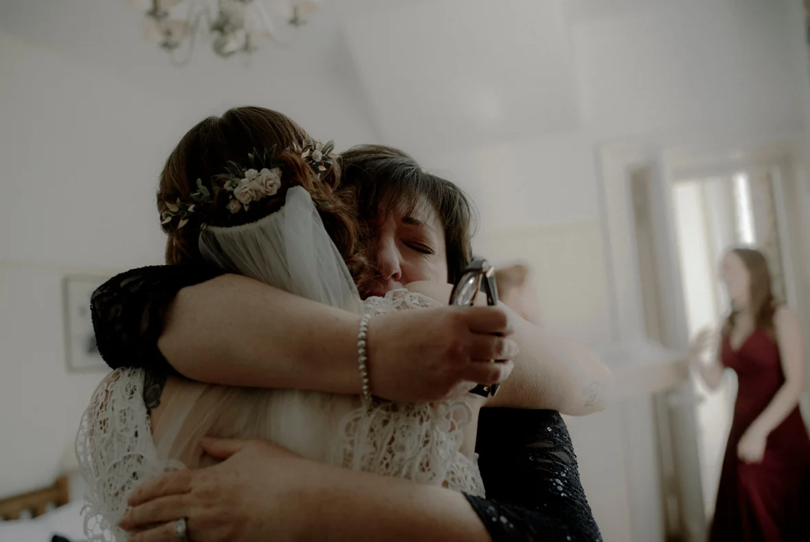 mum is hugging daughter