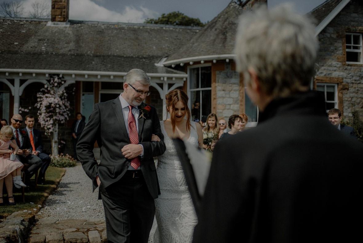 bride and her father walking