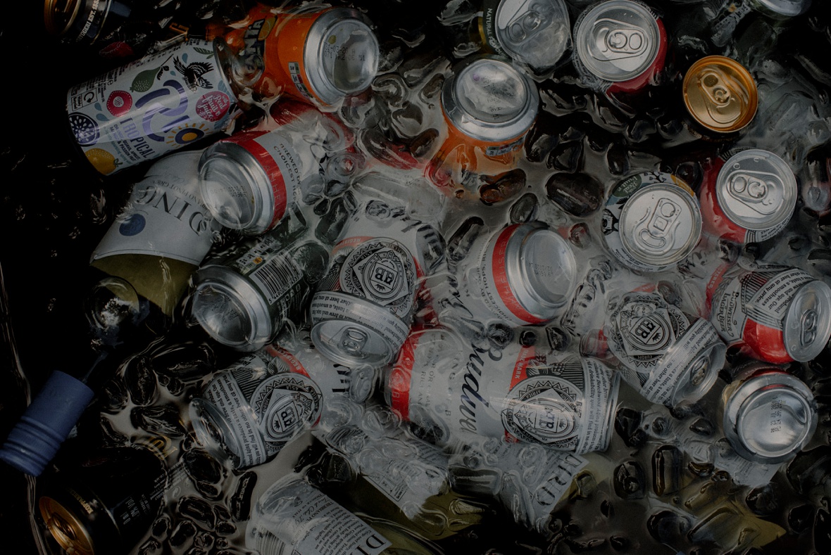 cans of beer in ice