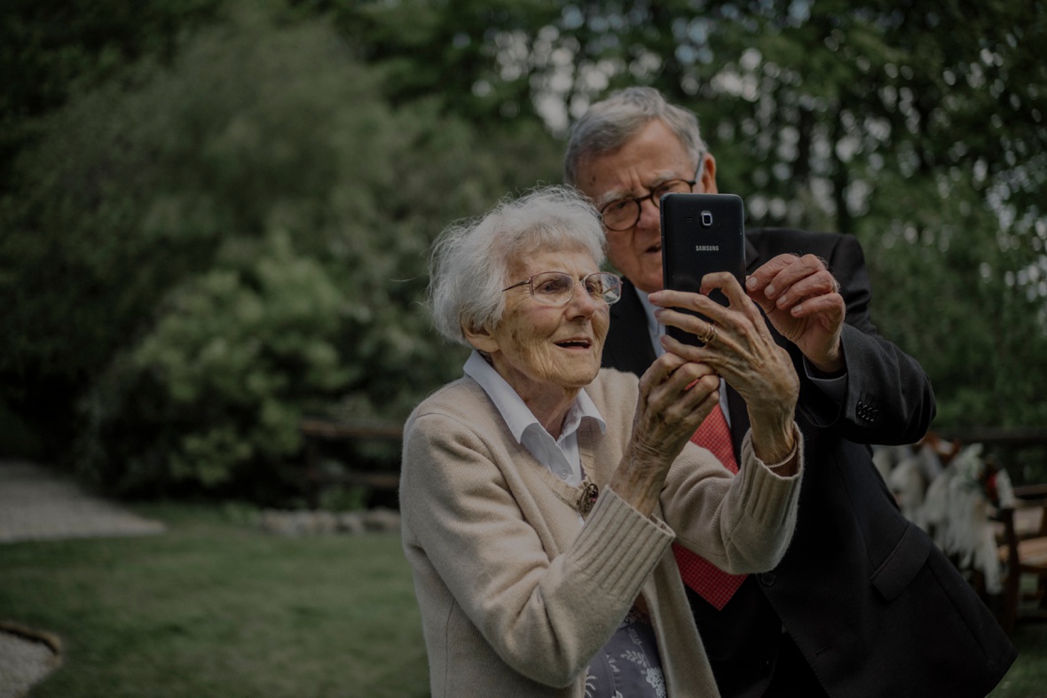 granny holding smartfone