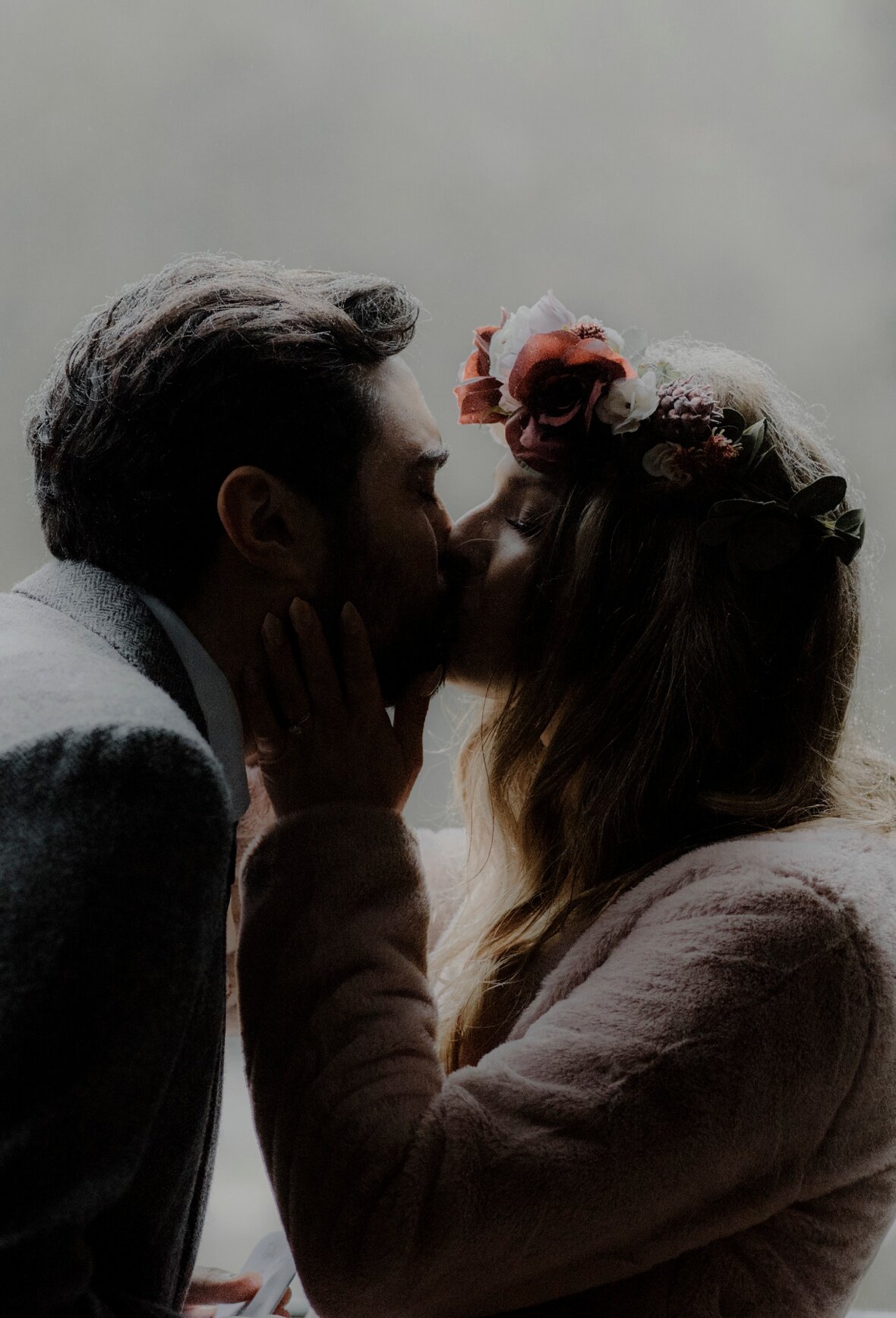 bride and groom kiss