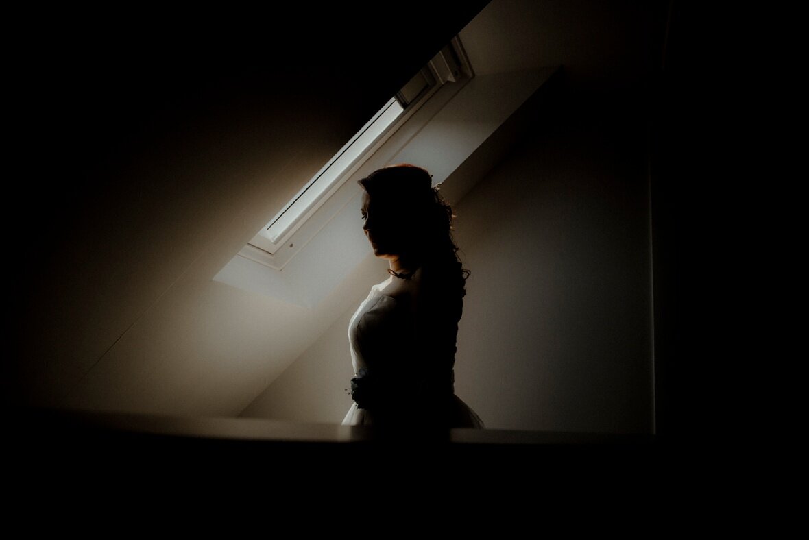 silhouette window light bride portrait