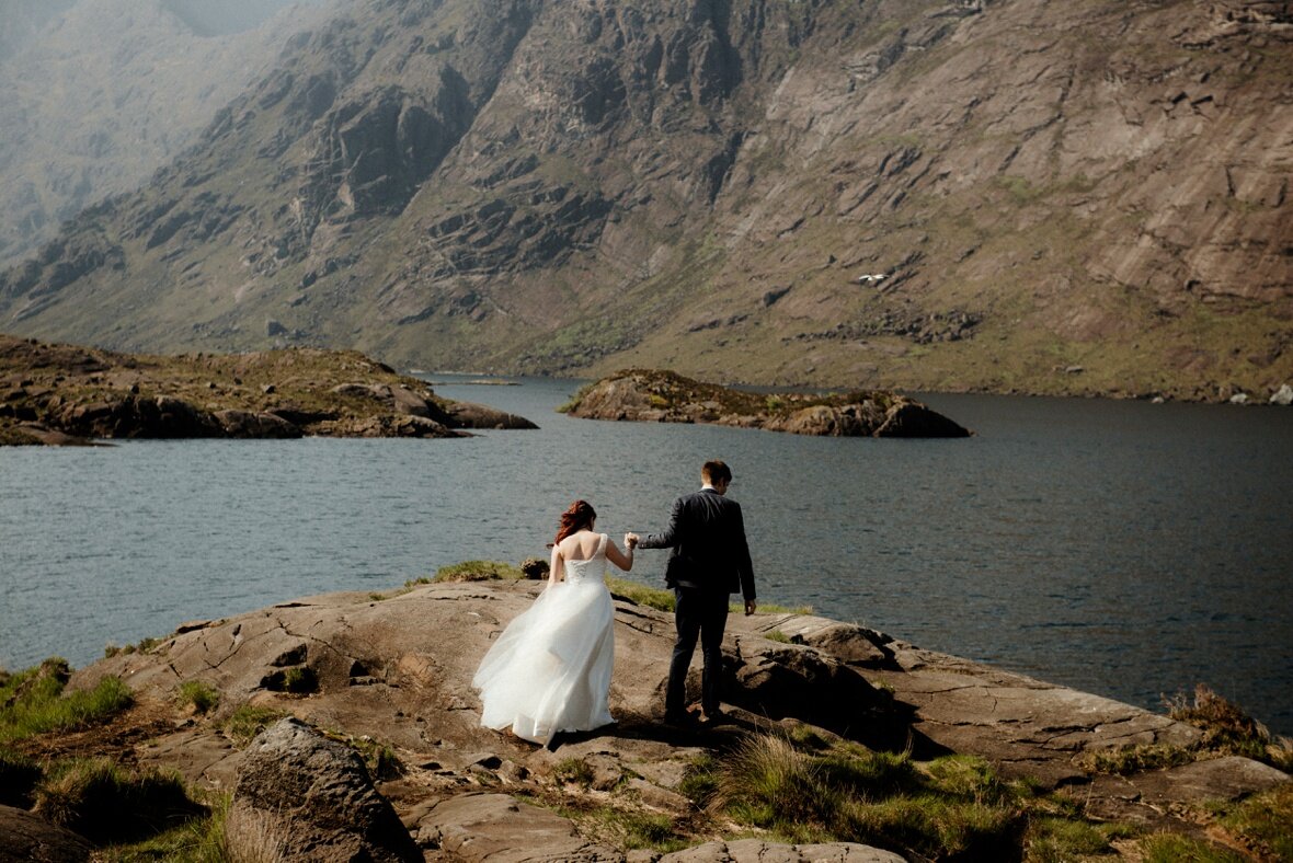 bride and groom during their ceremony Loch Coruisk