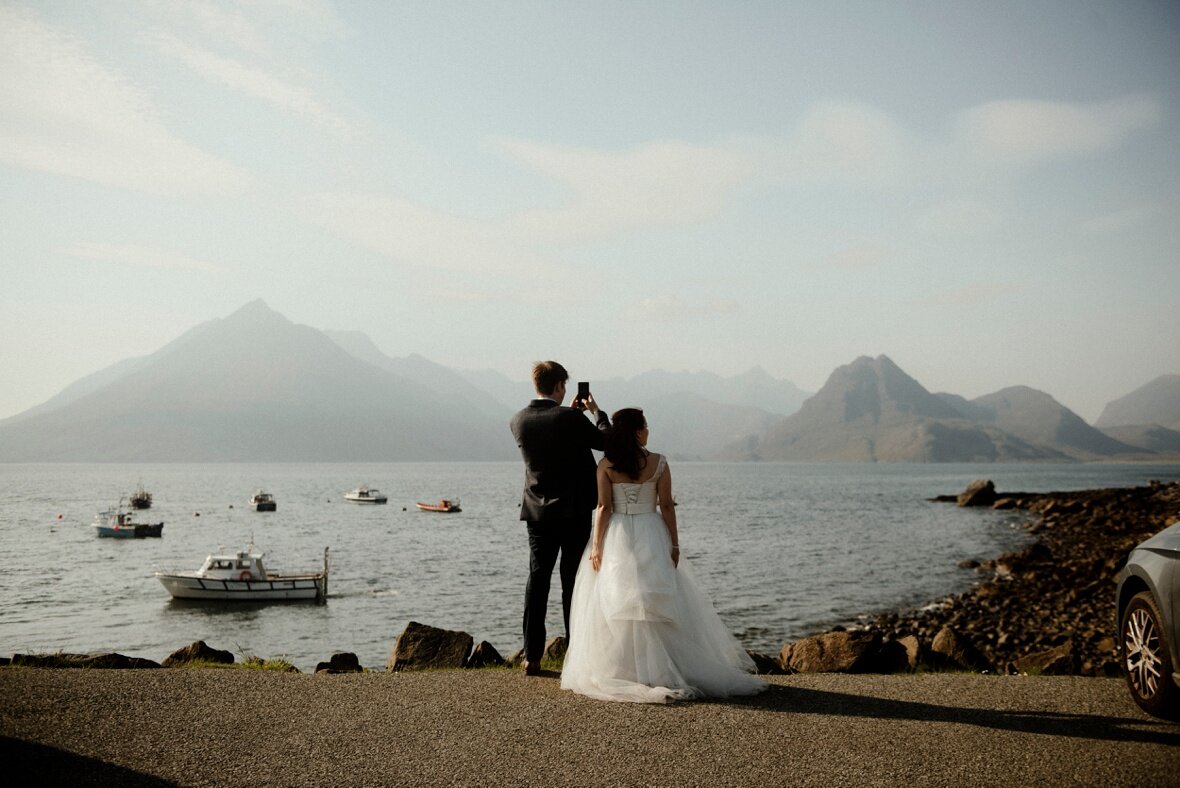 married couple taking selfie during their elopement 