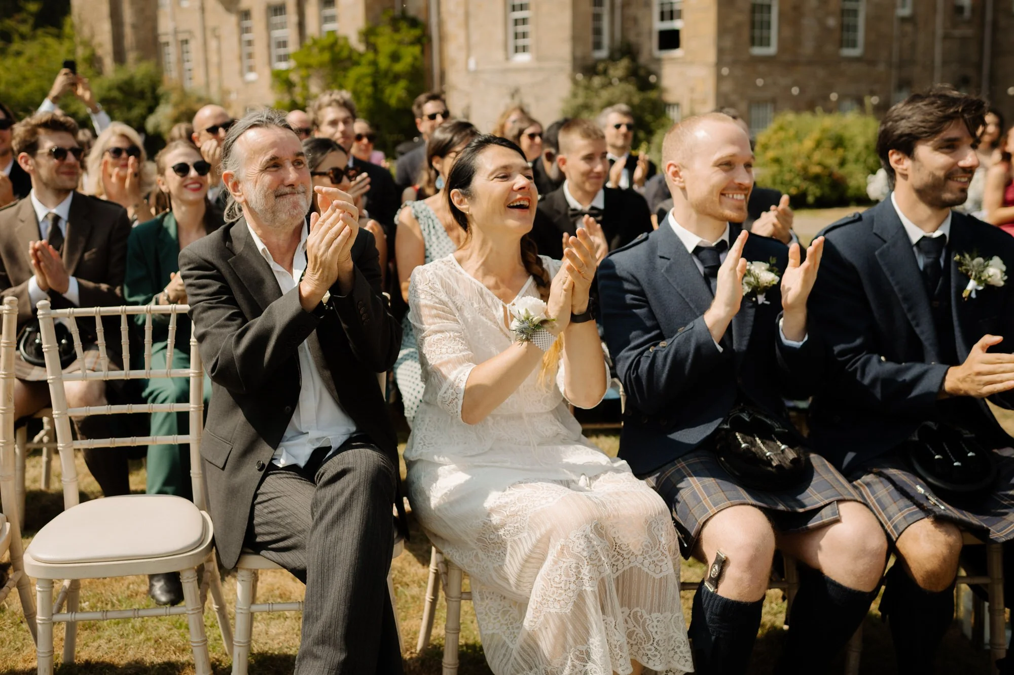 candid moments at wedding Carberry Tower