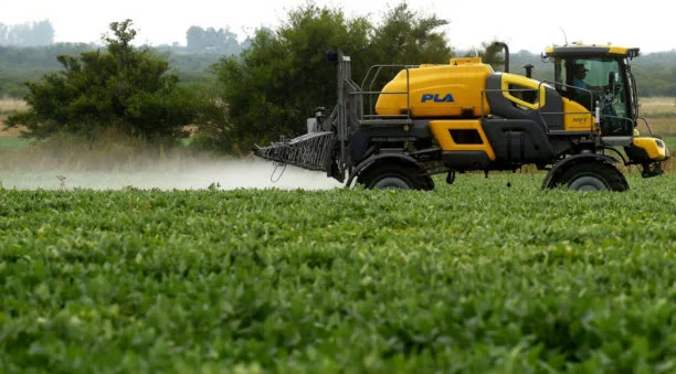 A farmer in Argentina, where glyphosate is used intensively, sprays a soybean field in Entre Rios province in February 2018. PABLO AHARONIAN/AFP/ GETTY IMAGES
