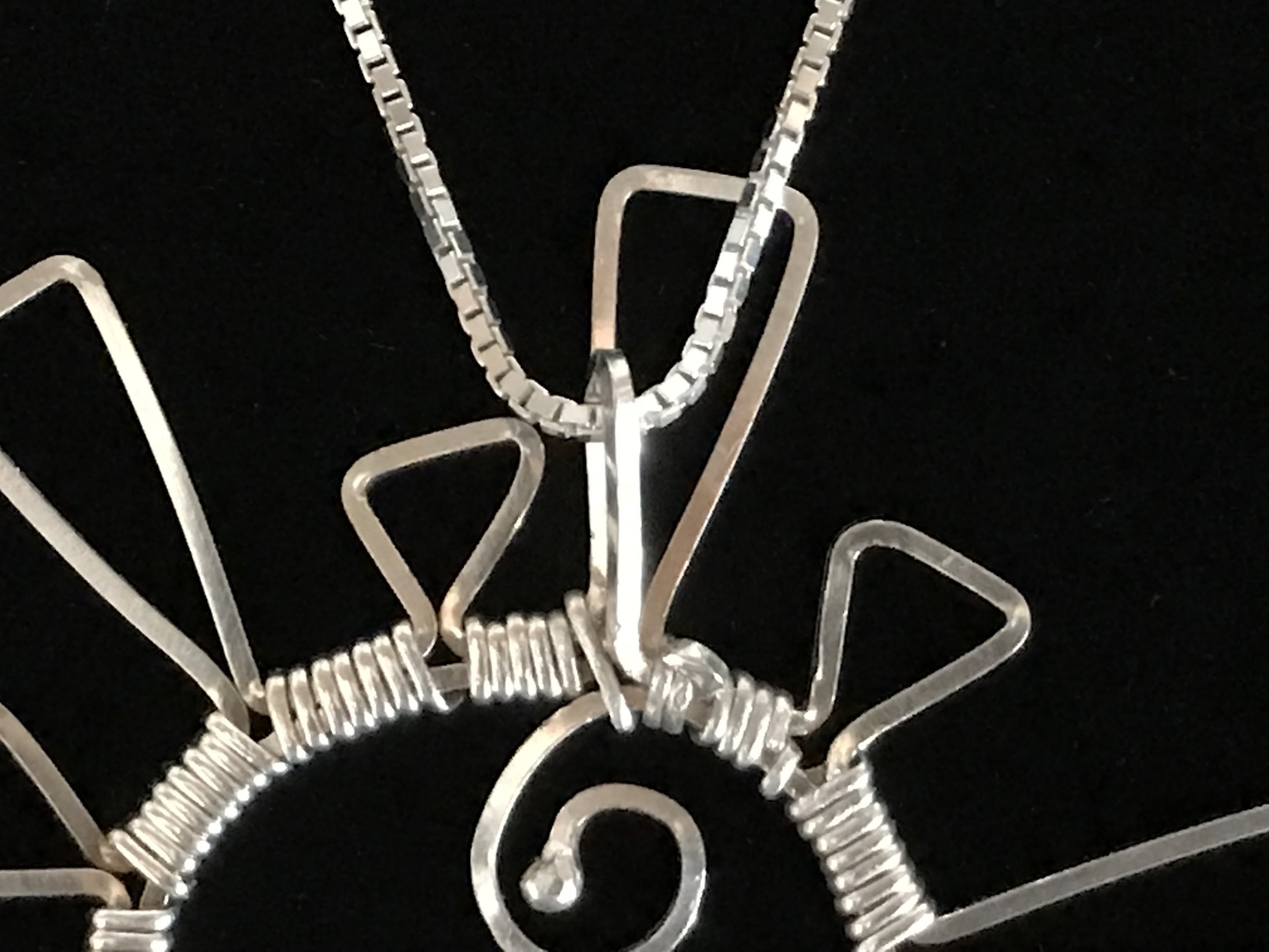 Starburst bail (back)