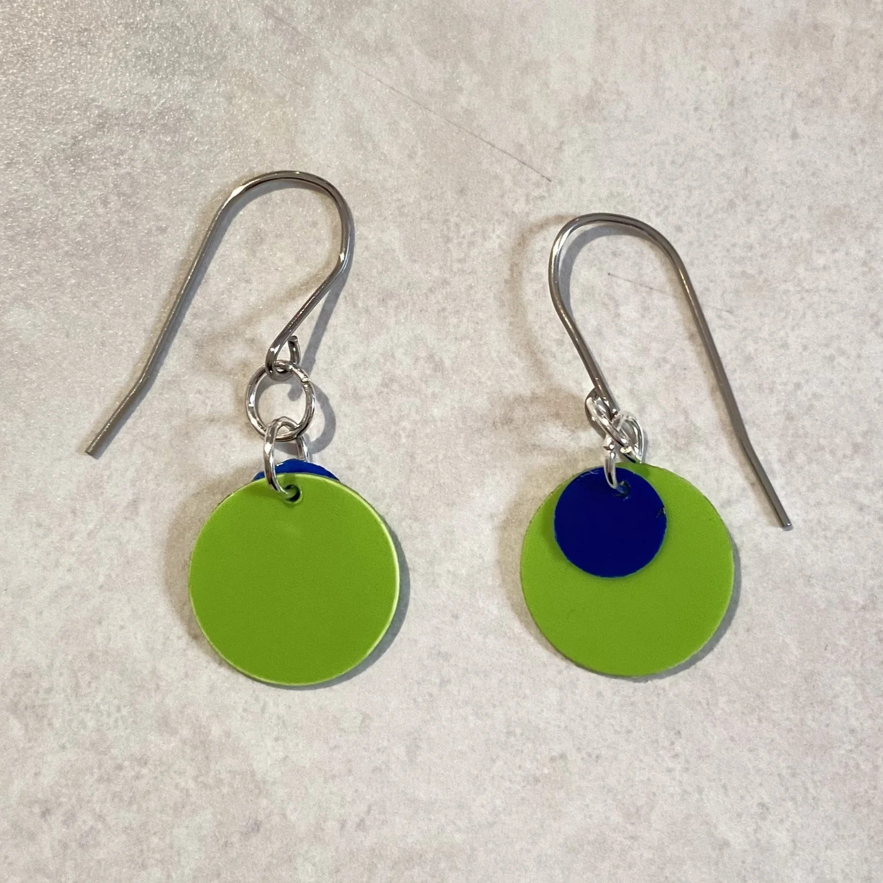 earring back blue and green recycled plastic earrings have a retro style
