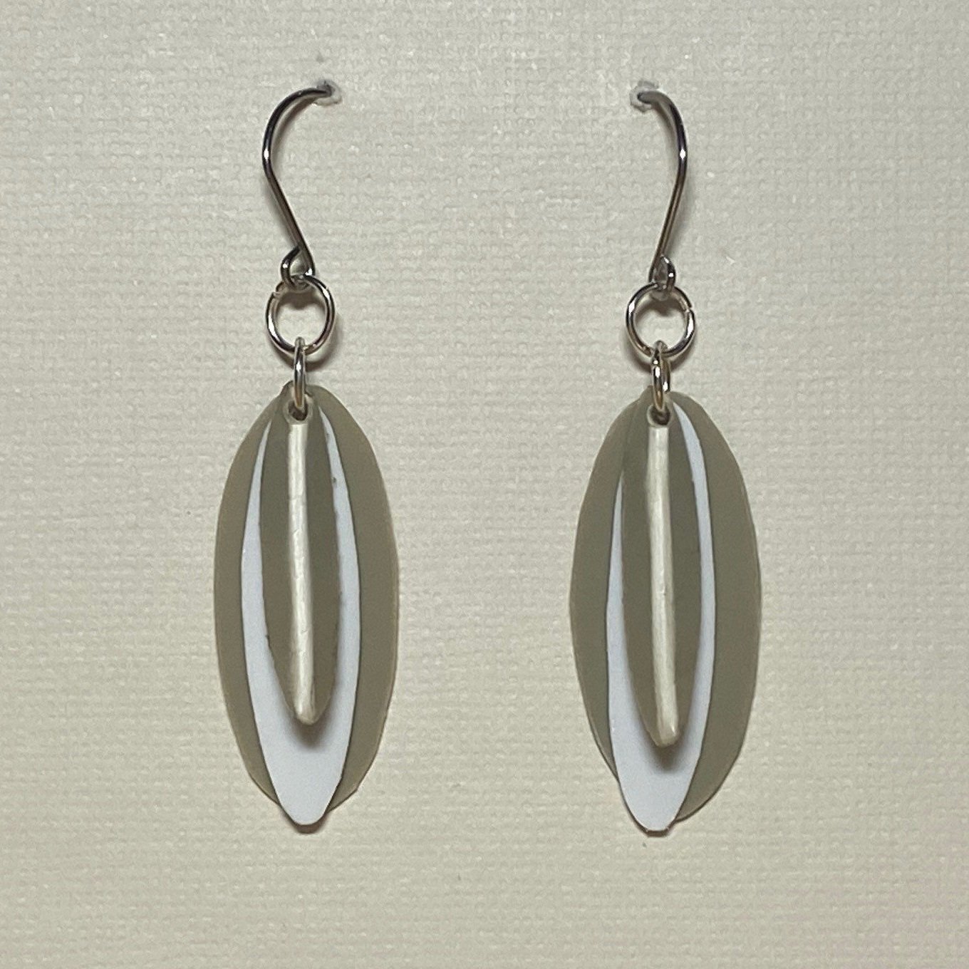Tan and White dangle earrings