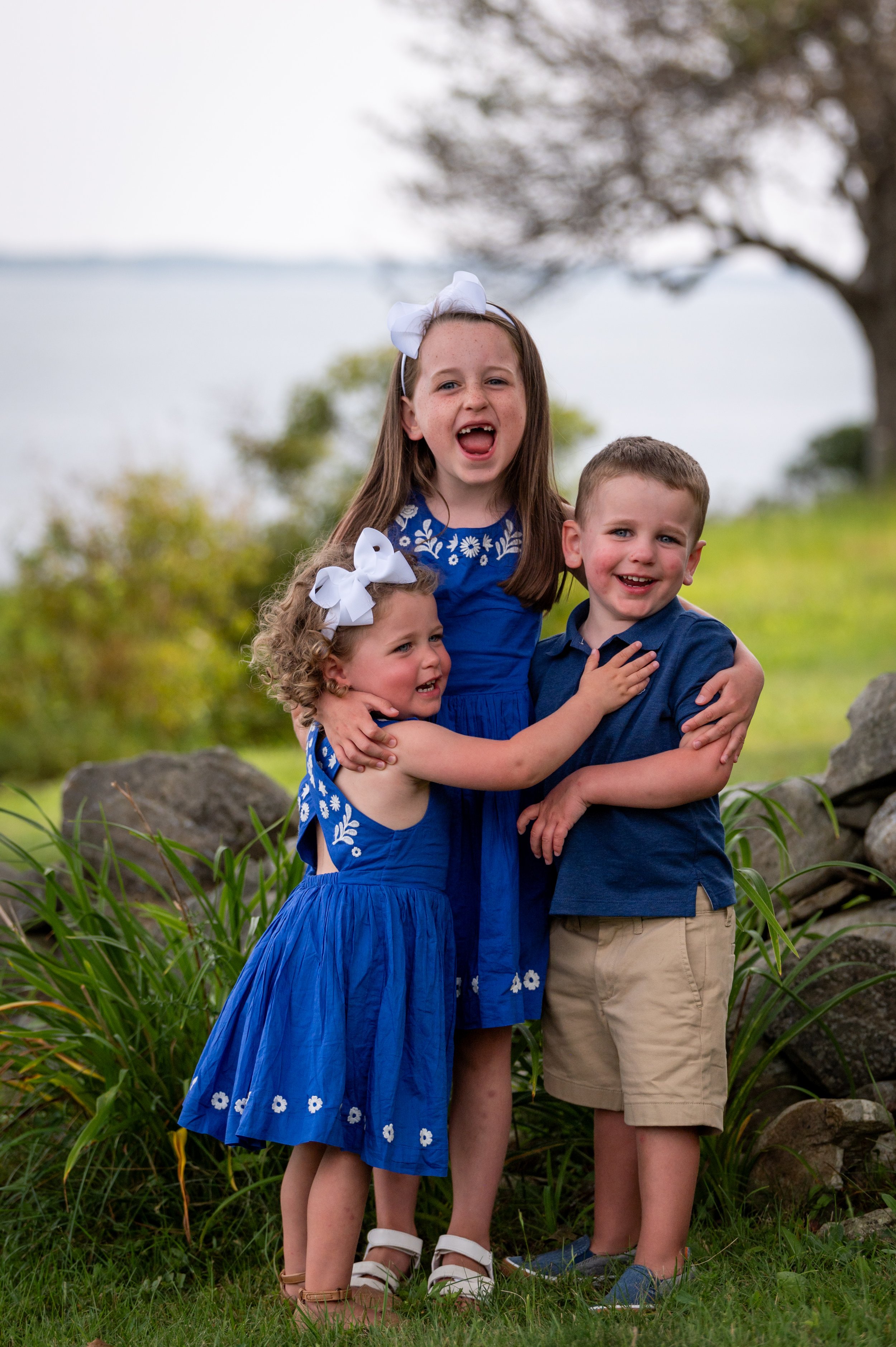 lindsay murphy photography | portland maine family photographer | chebeague island family kids hugging.jpg