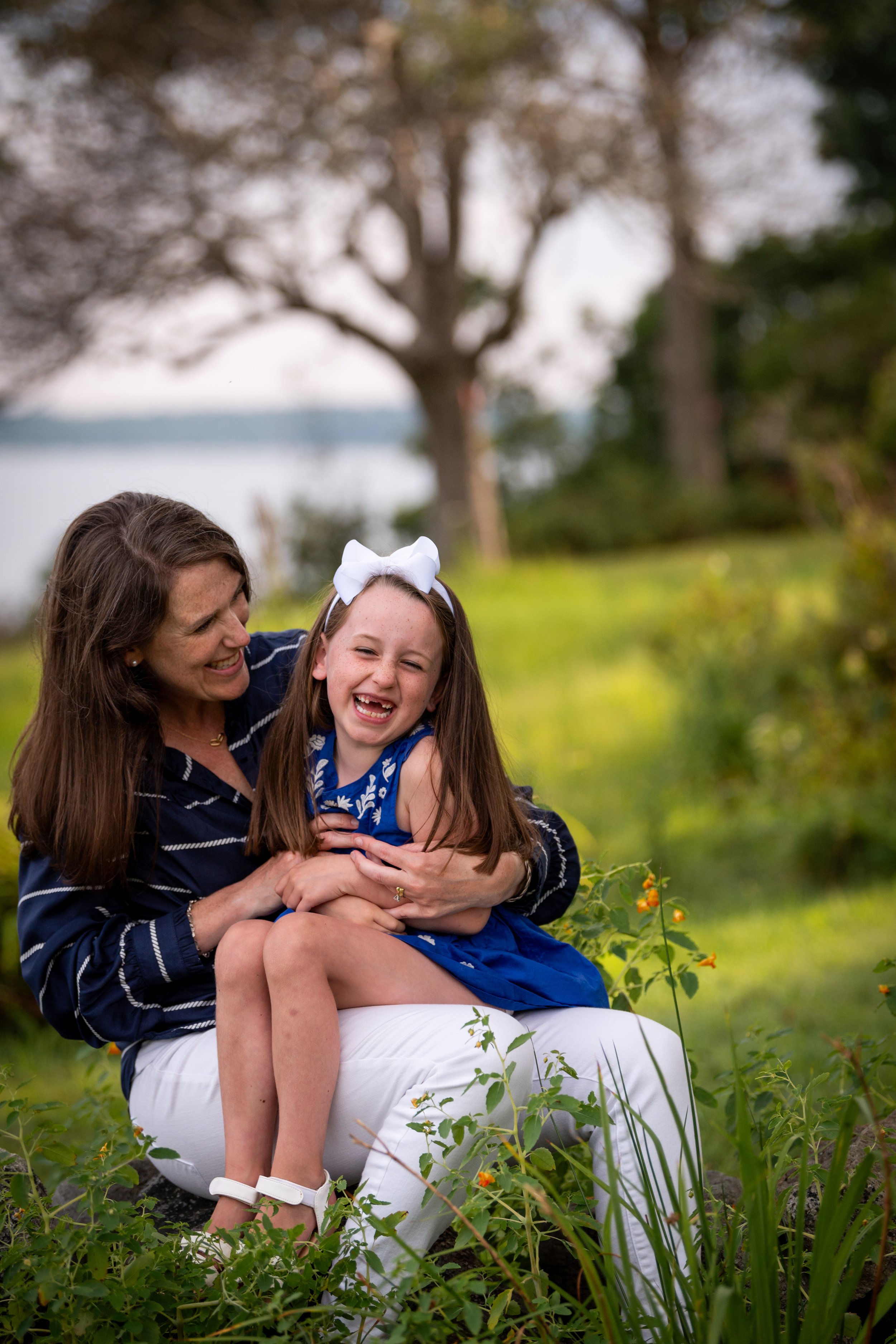lindsay murphy photography | portland maine family photographer | chebeague island mother daughter candid photo.jpg