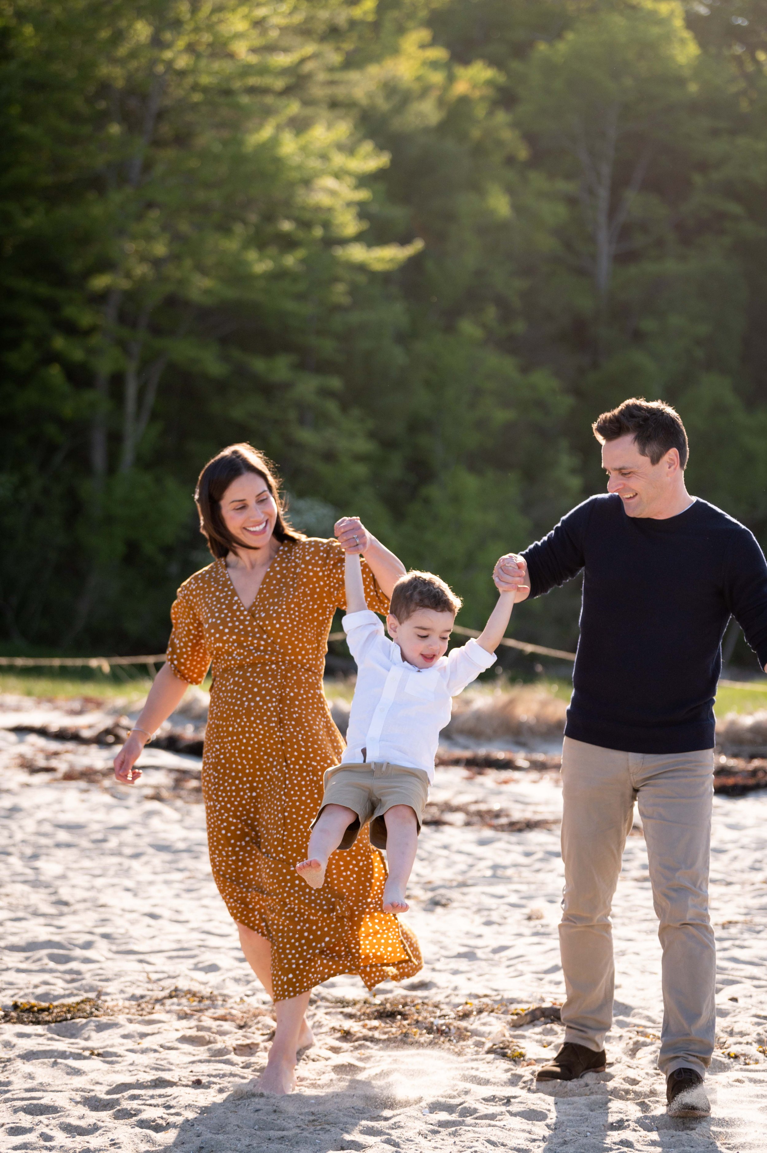 lindsay murphy photography | portland maine family photographer | maine family swinging and walking on beach.jpg