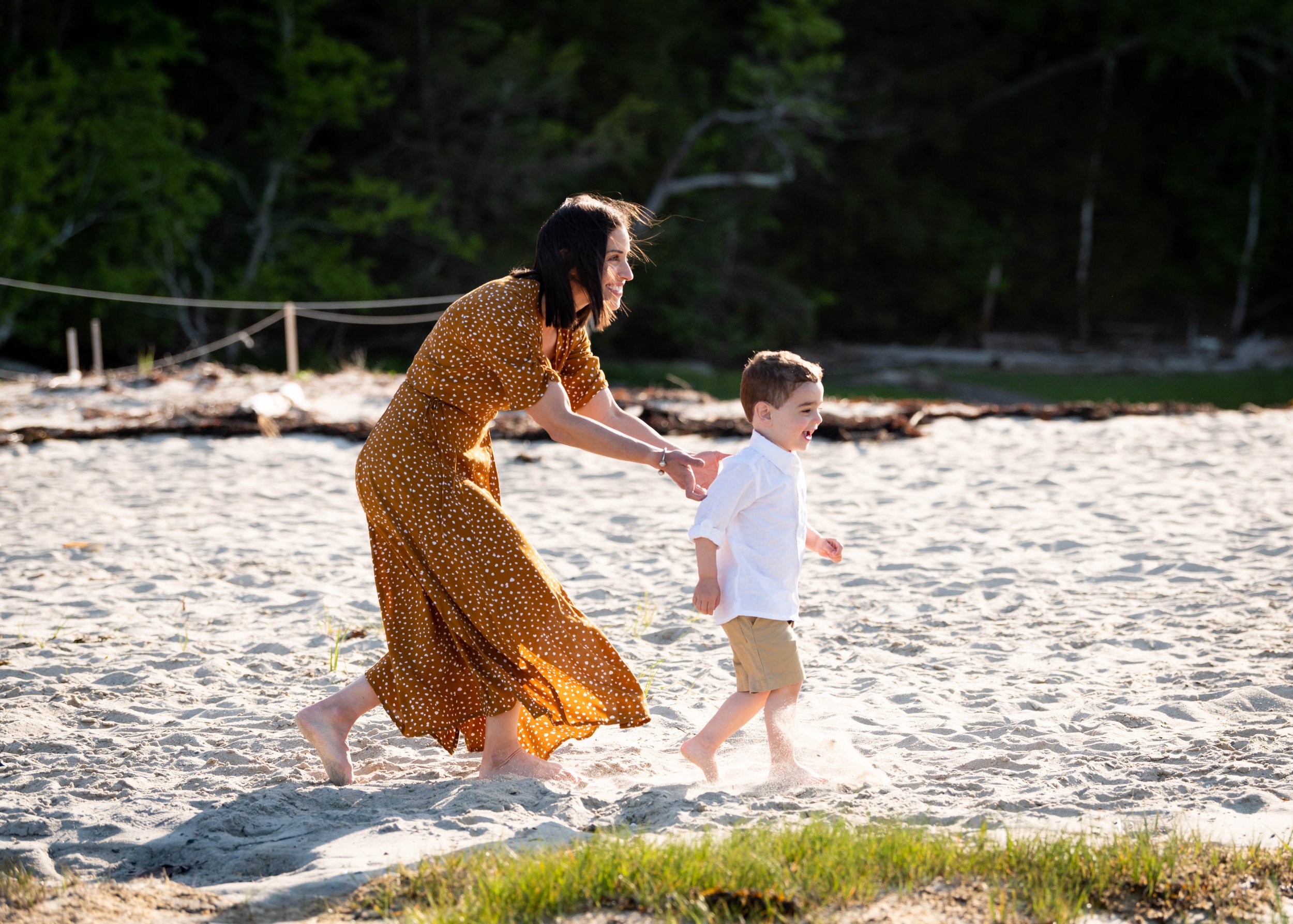 lindsay murphy photography | portland maine family photographer | mom and son running on beach broad cove cumberland.jpg