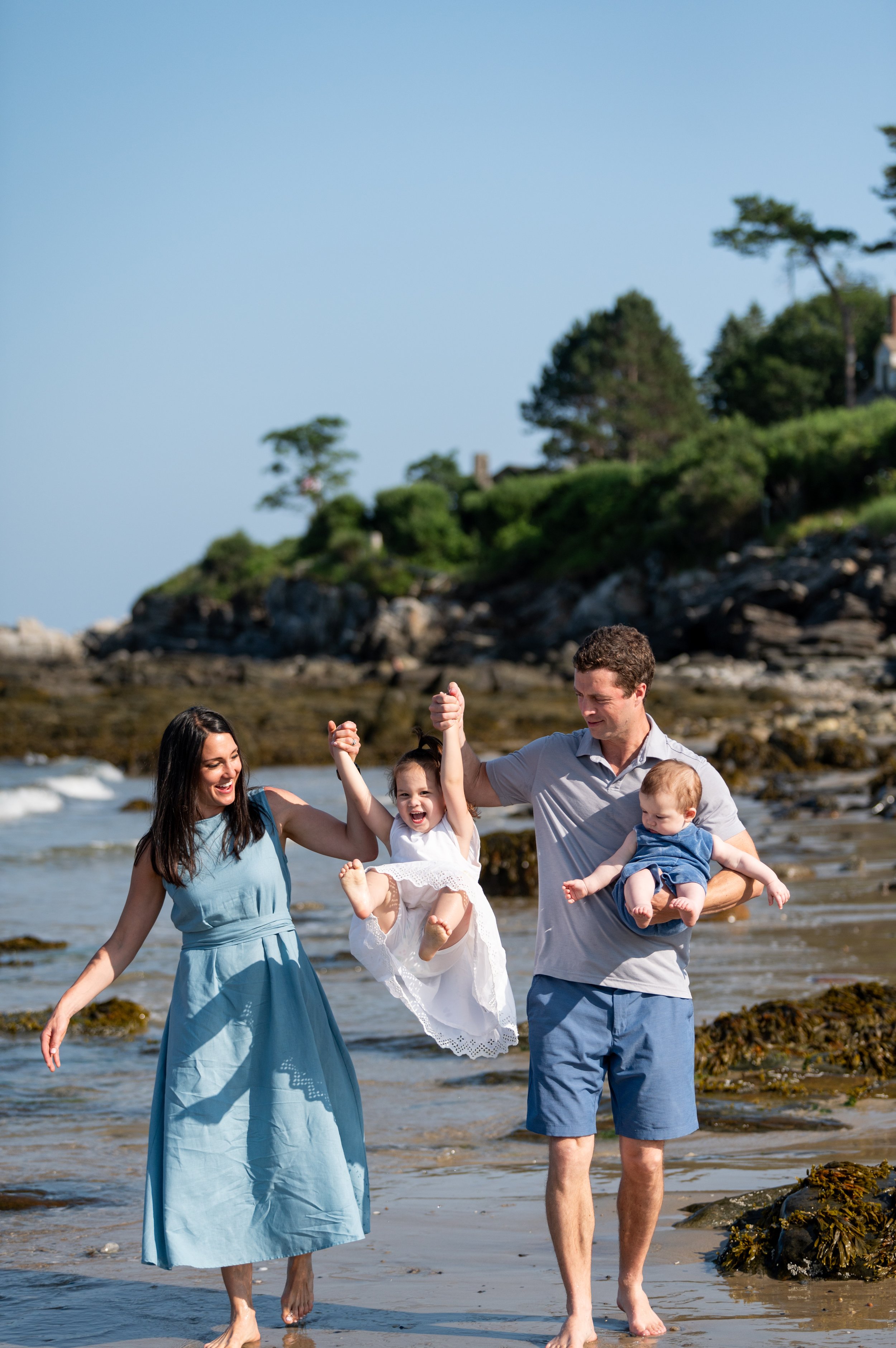 lindsay murphy photography | portland maine family photographer | prouts neck family swinging on beach laughing.jpg