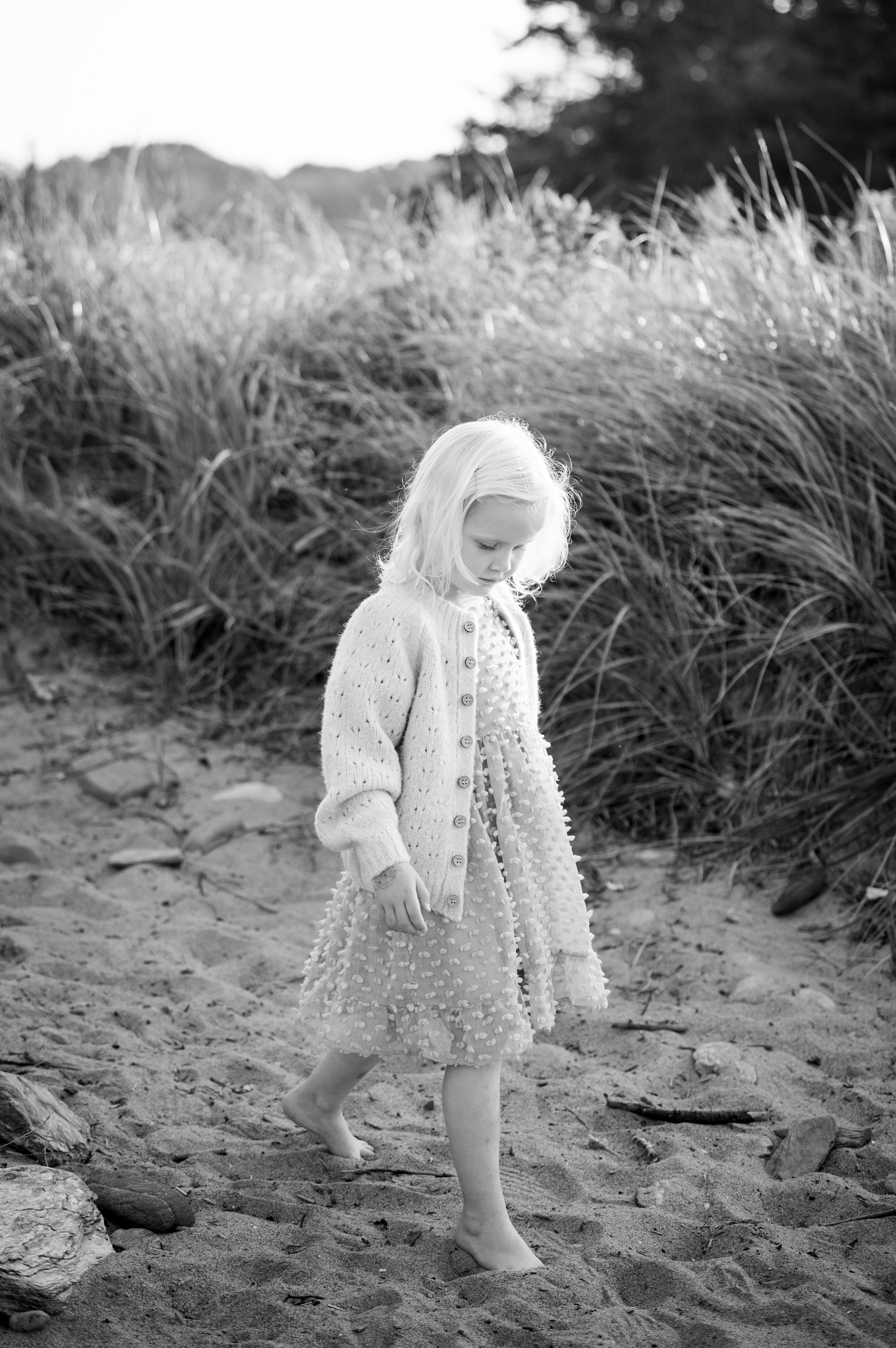 lindsay murphy photography | portland maine family photographer | cape elizabeth little girl walking on beach black and white.jpg