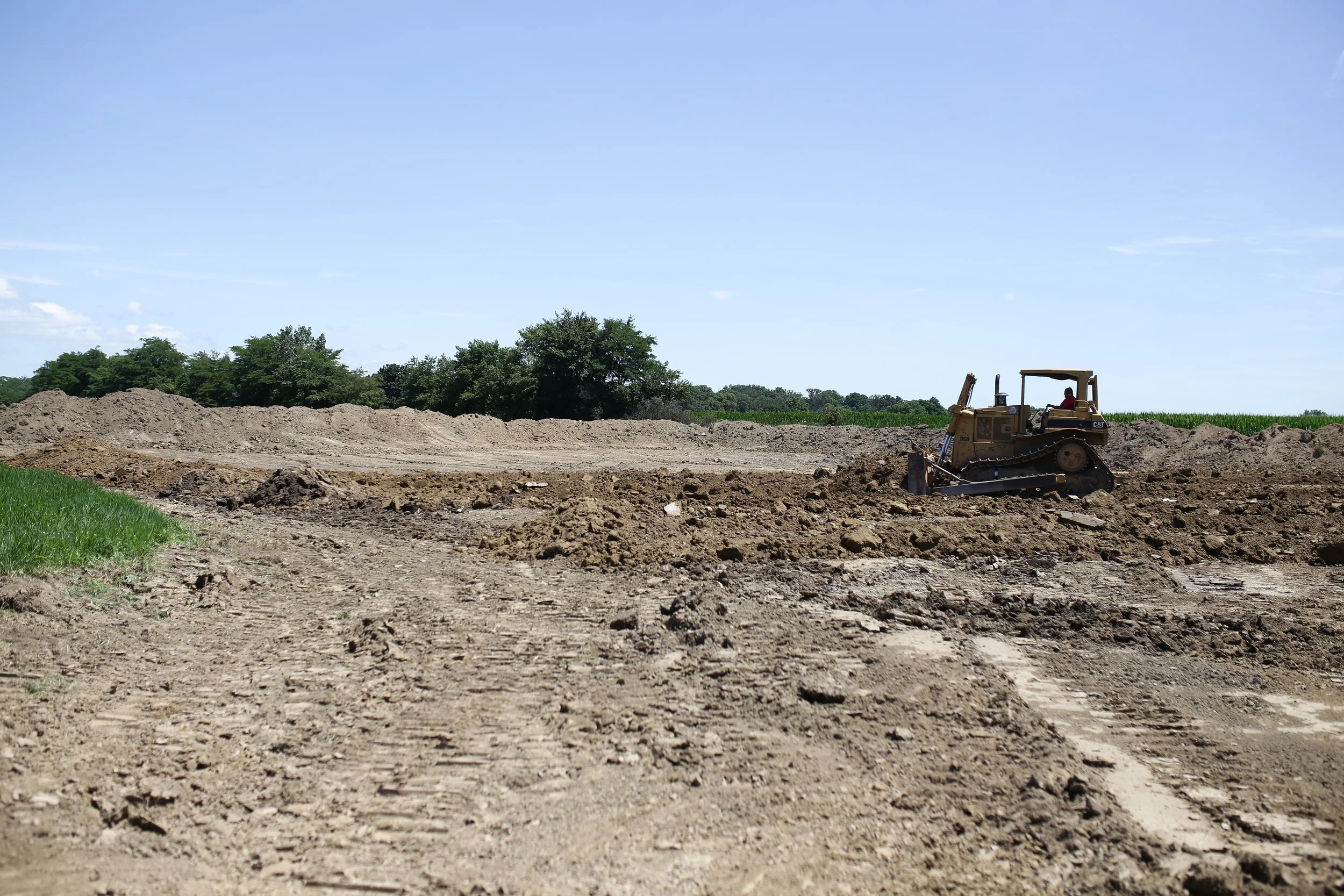  Stripping top soil before beginning the excavation of a hog barn pit in St. Marys, Ohio.  