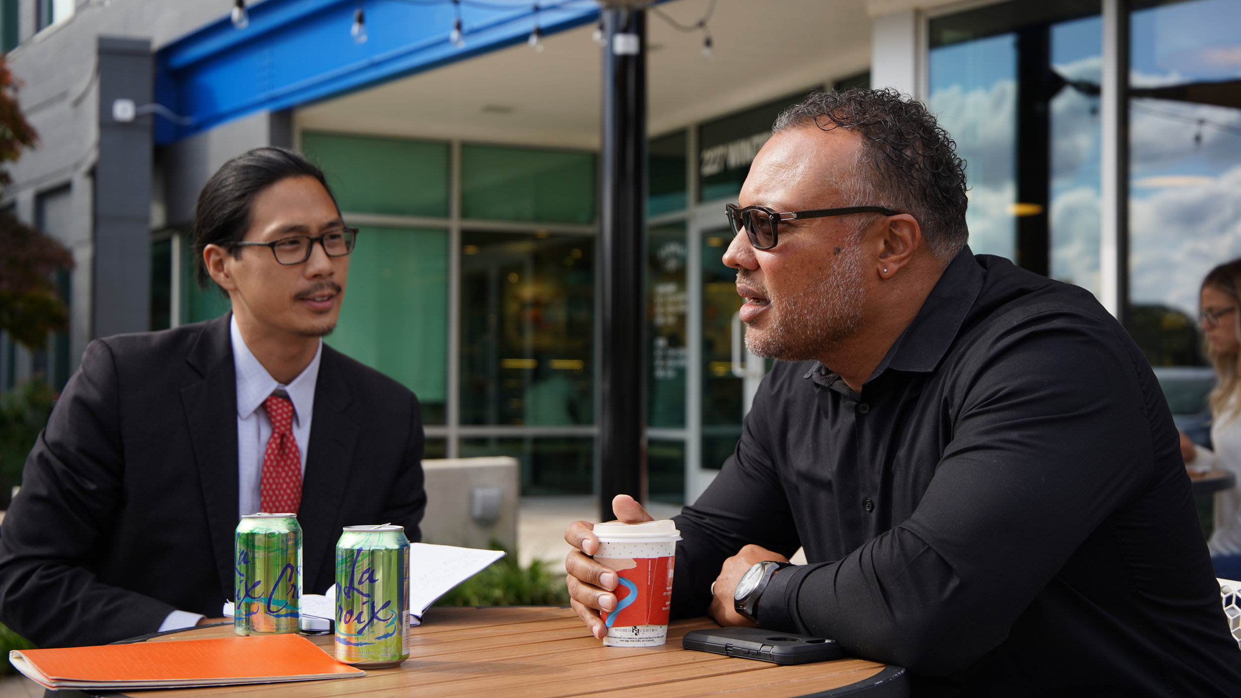  Brian Chen, Policing Project senior program manager, and Joe Jones, 2nd Ward Commissioner and president of the Urban League of West Michigan 