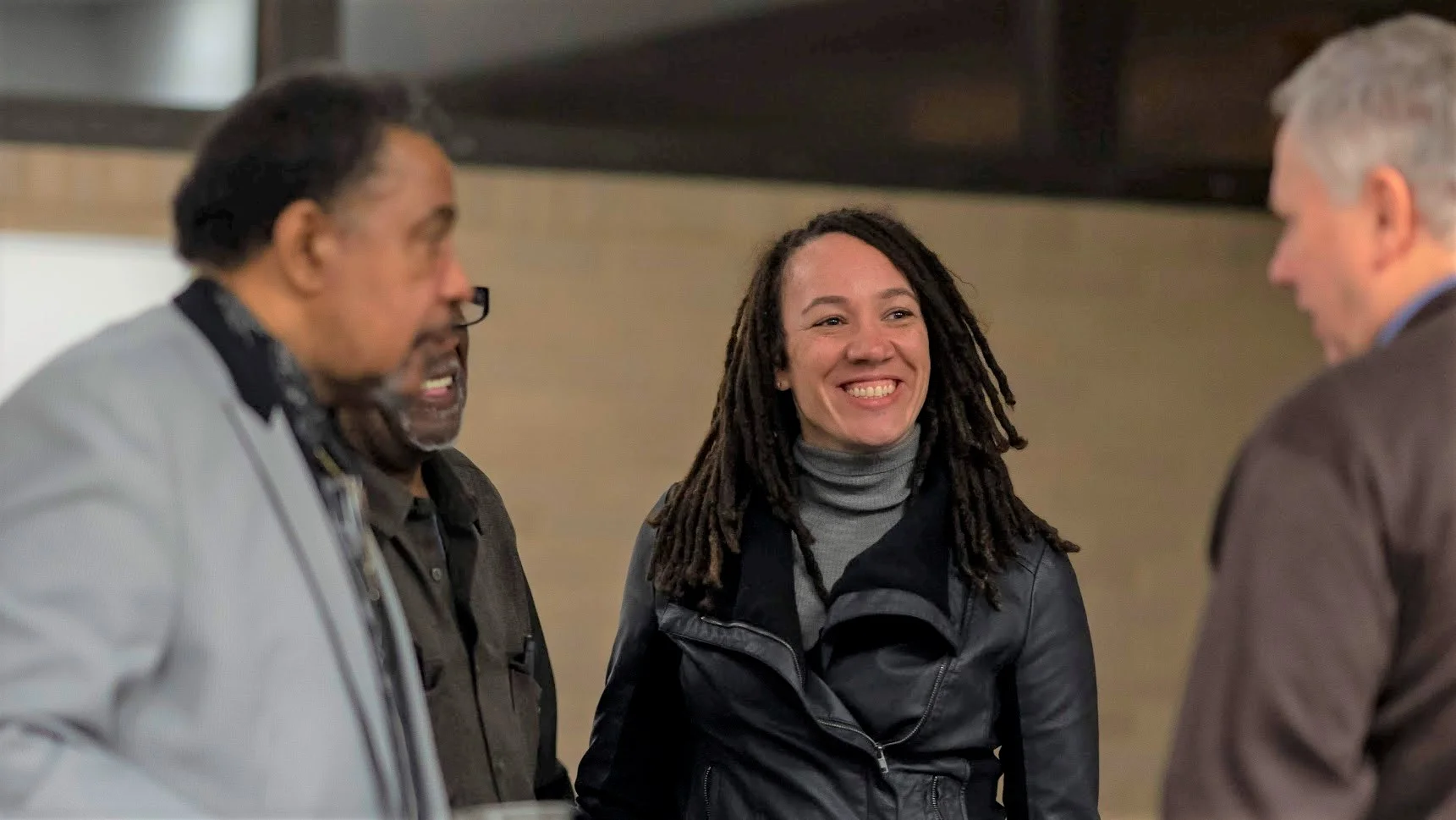 Policing Project Senior Program Manager Regina Holloway (center) and Distinguished Senior Fellow Robert Haas (right) meeting with Chicago Police Department officials and community members.