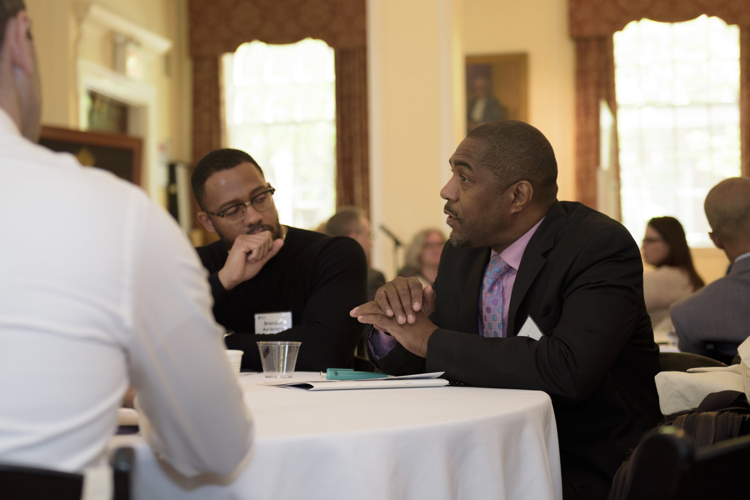 Divine Pryor, executive director of Center for Nuleadership on Urban Solutions, with Brandon Anderson, founder of Raheem AI.