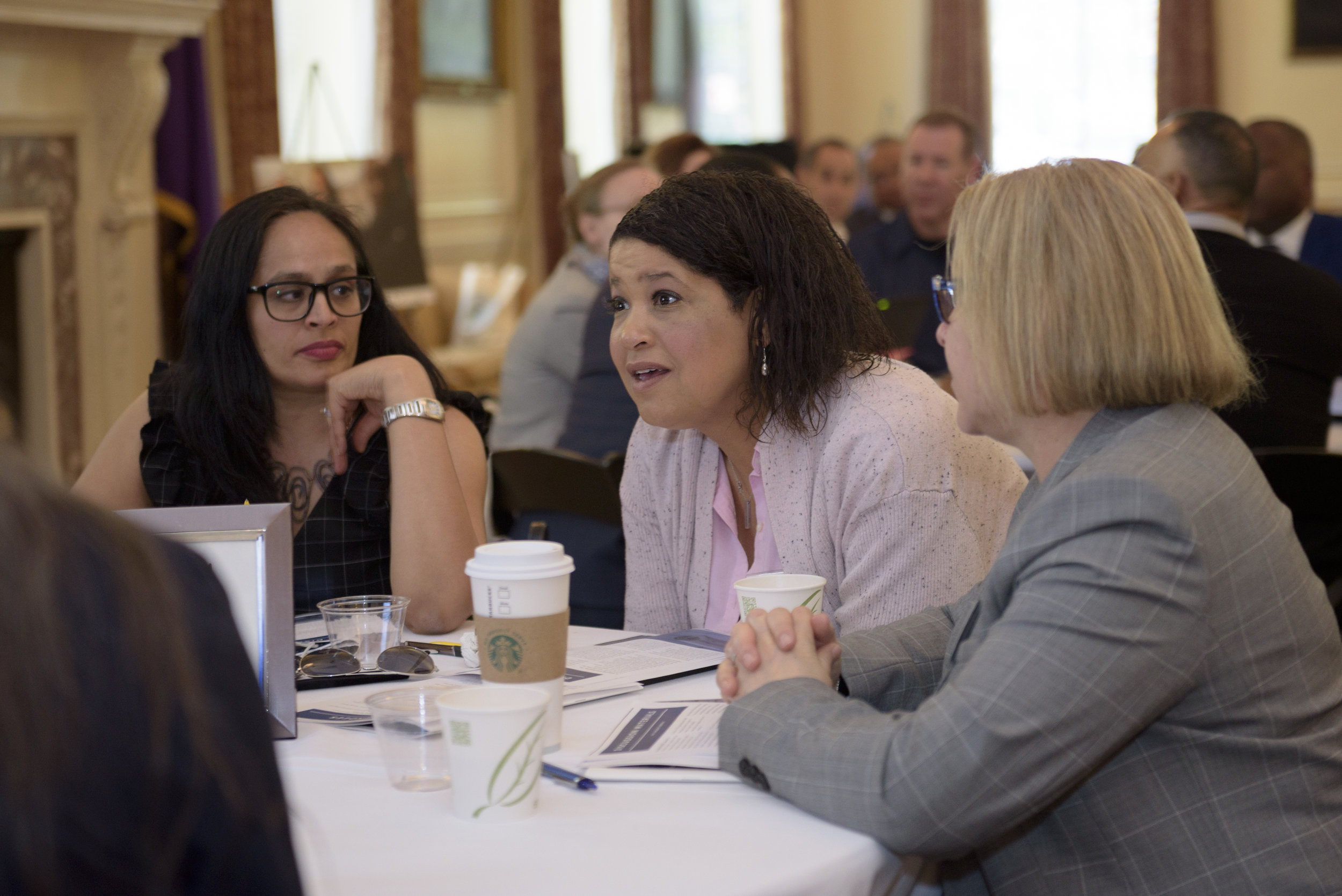 (From left): Susan Shah, of Trinity Church Wall Street, and Lex Scott, of the Community Advocates Group of Salt Lake City and Black Lives Matter Utah, in small group conversation.