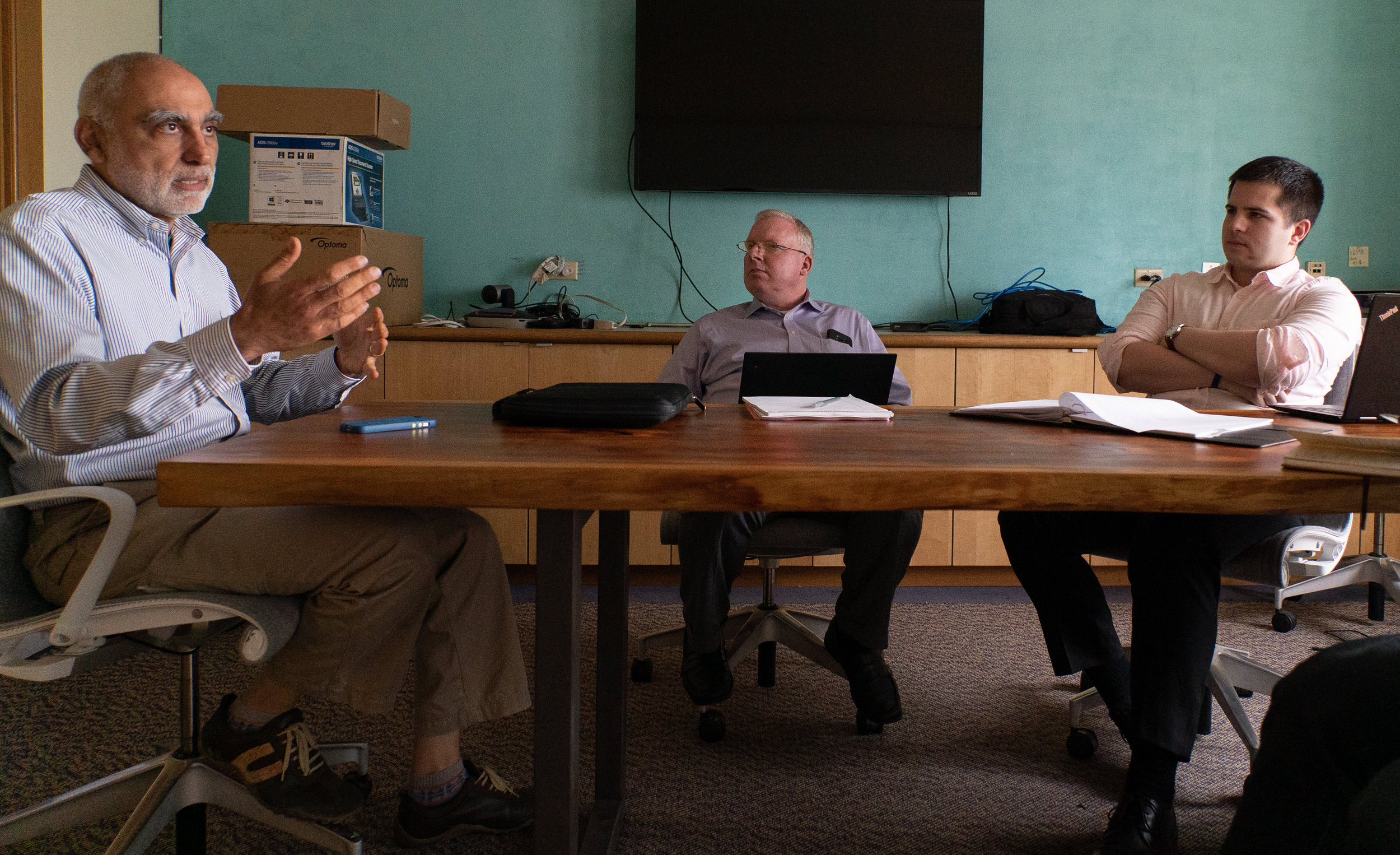  OPAC member Saied Karamooz talks with John Steinbach and Michael Faris of Latham &amp; Watkins.  