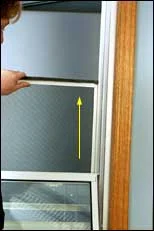 Slide screen up to clear bottom track.