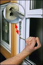 Use screwdriver to pull shoes down, turning C-shaped openings to vertical, facing you.