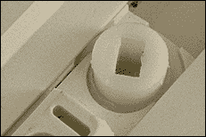 Use screwdriver to turn top and bottom shoes until slots are parallel with window frame.