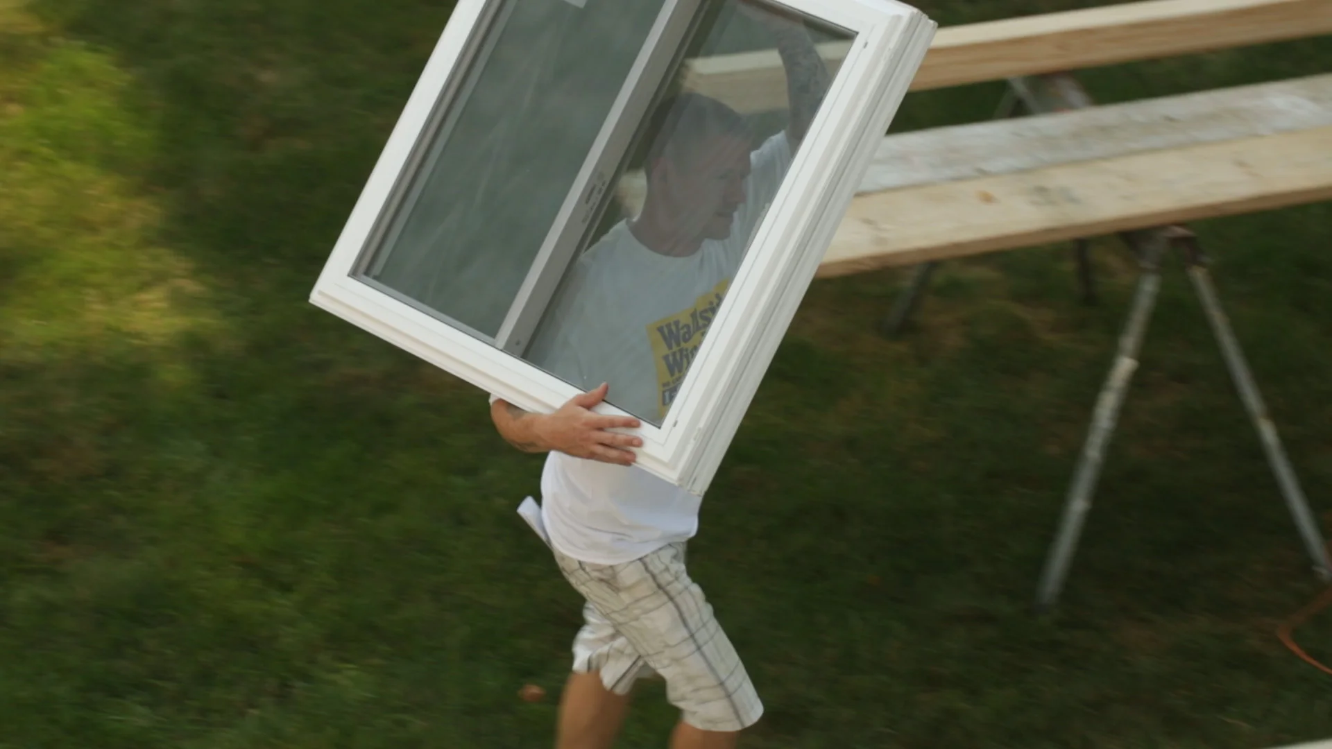Guy walking w_ window over shoulder.jpg