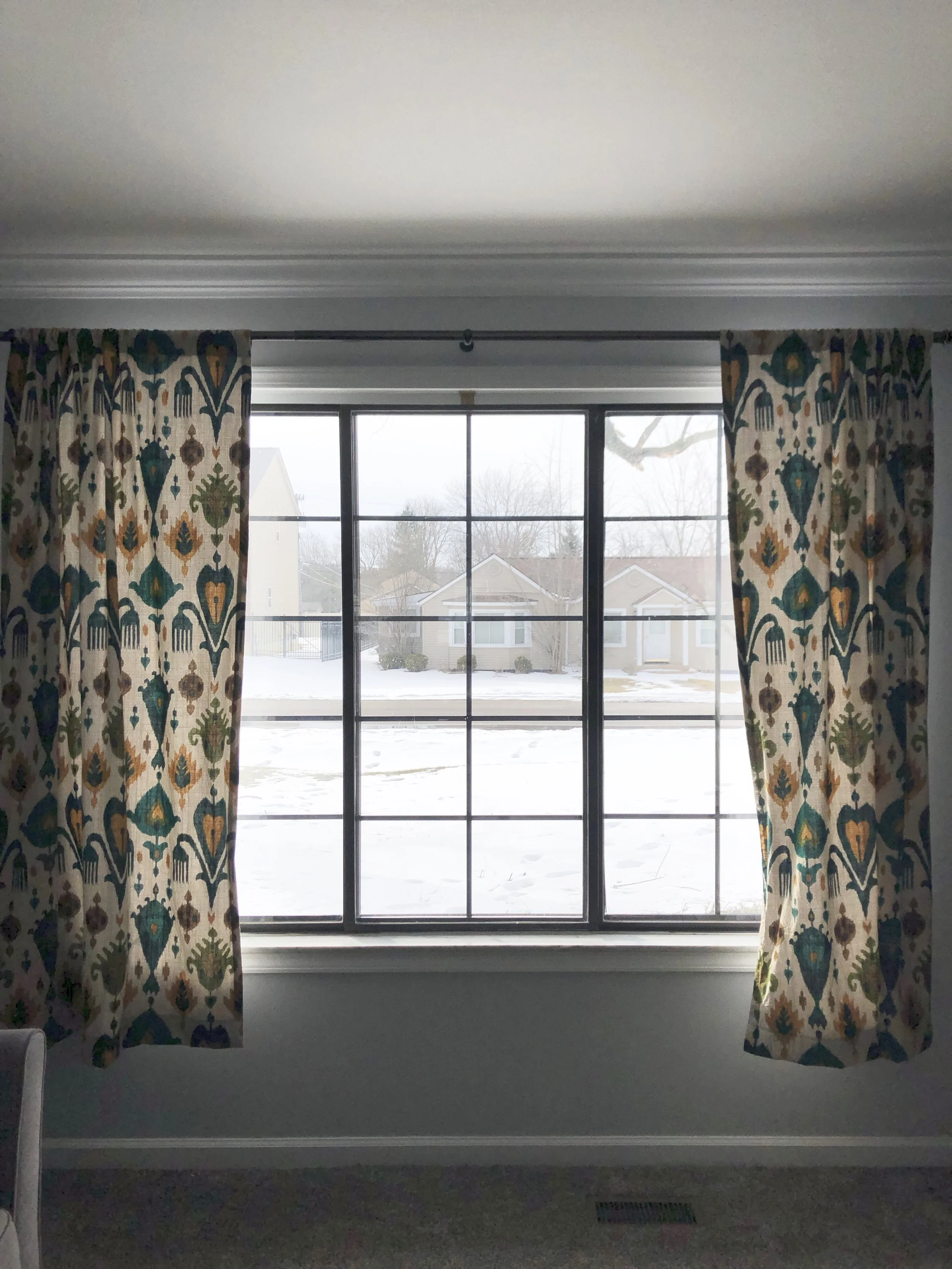 These original windows were replaced by Wallside Windows.