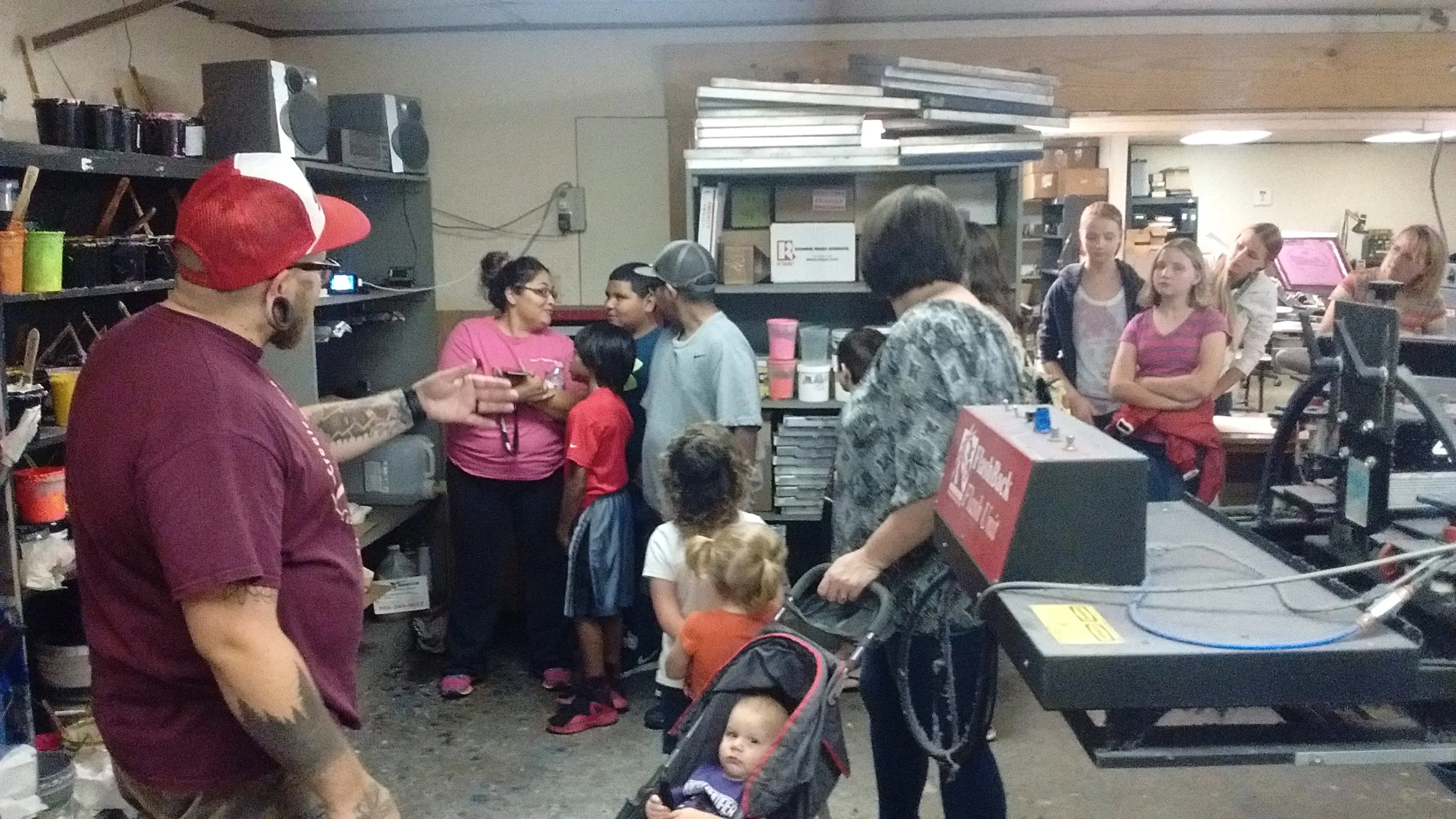 Broc, our Art Director, explaining different types of inks used by screen printers.