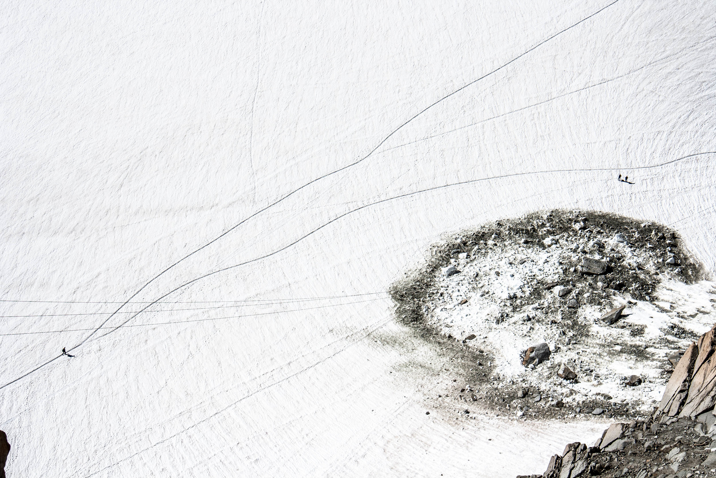 People and rocks in Alps.jpg