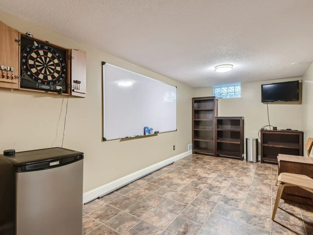 25 Lower Level Recreation Room.jpg