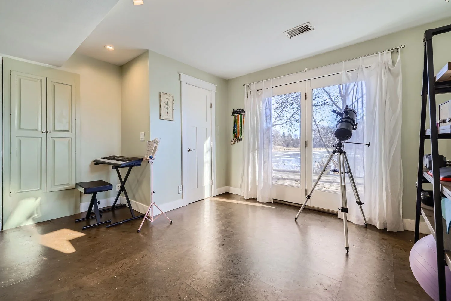9171 130th St. N - Web Quality - 025 - 26 Lower Level Family Room.jpg