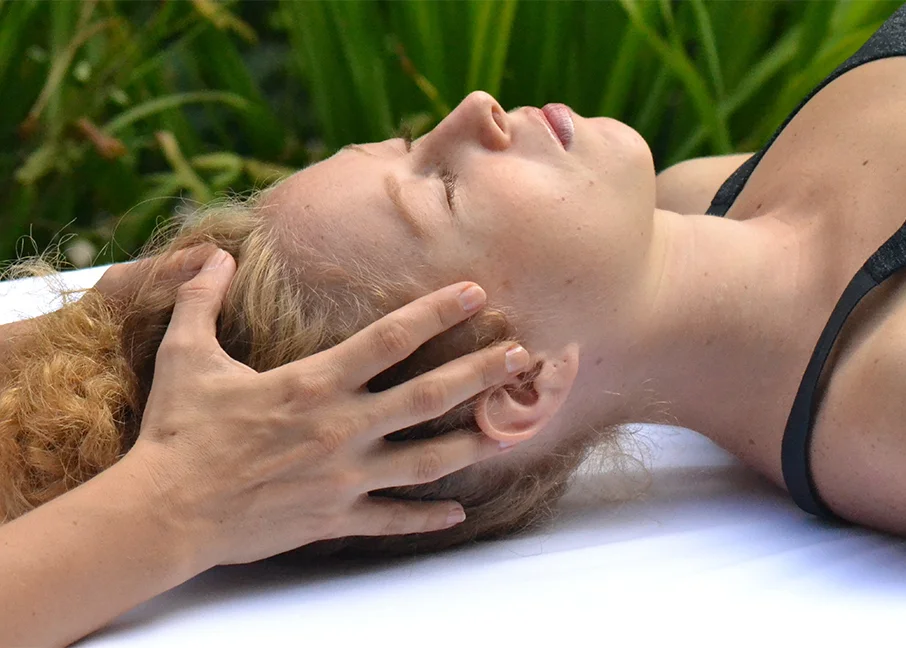 Hands on head.