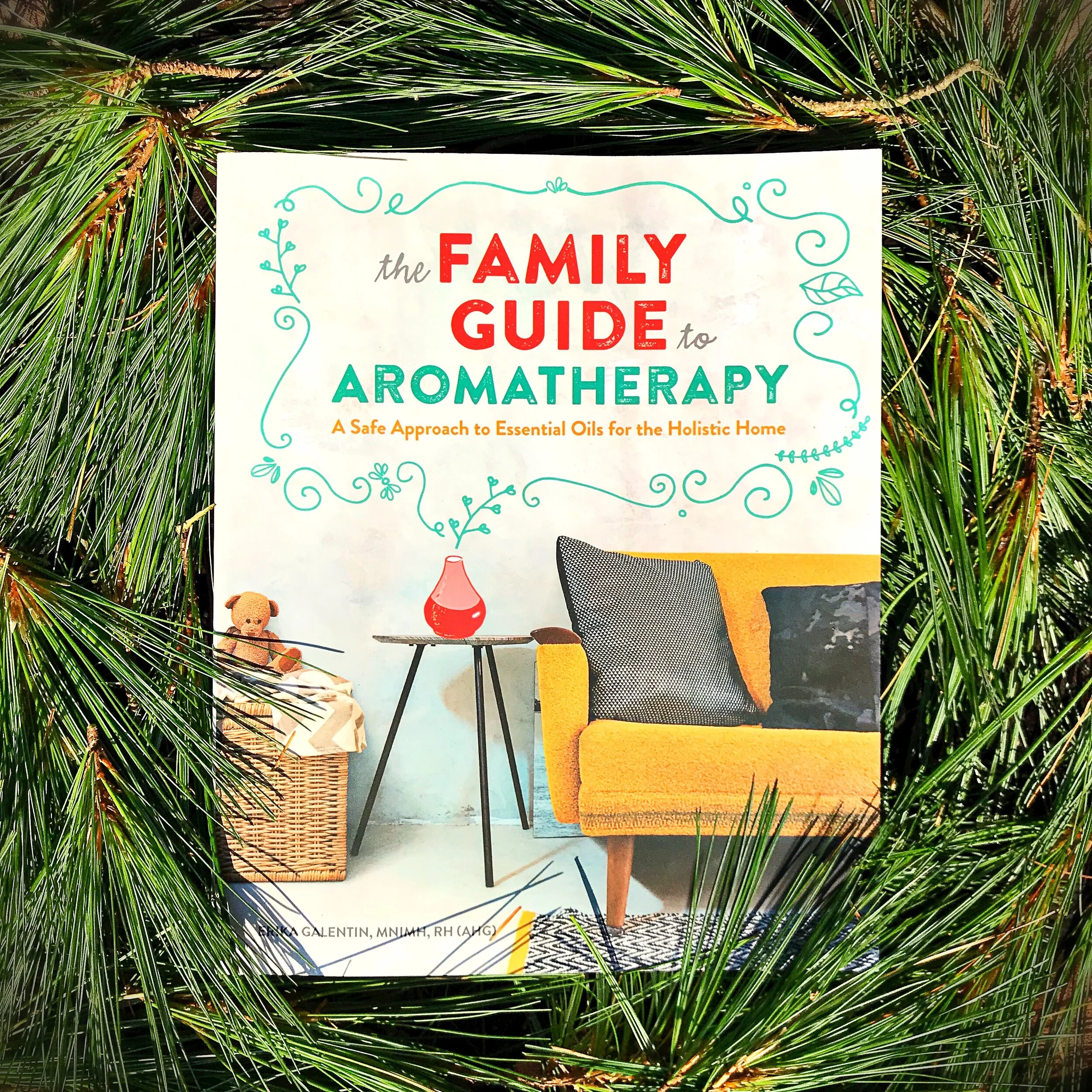 The Family Guide of Aromatherapy Book on pine needles