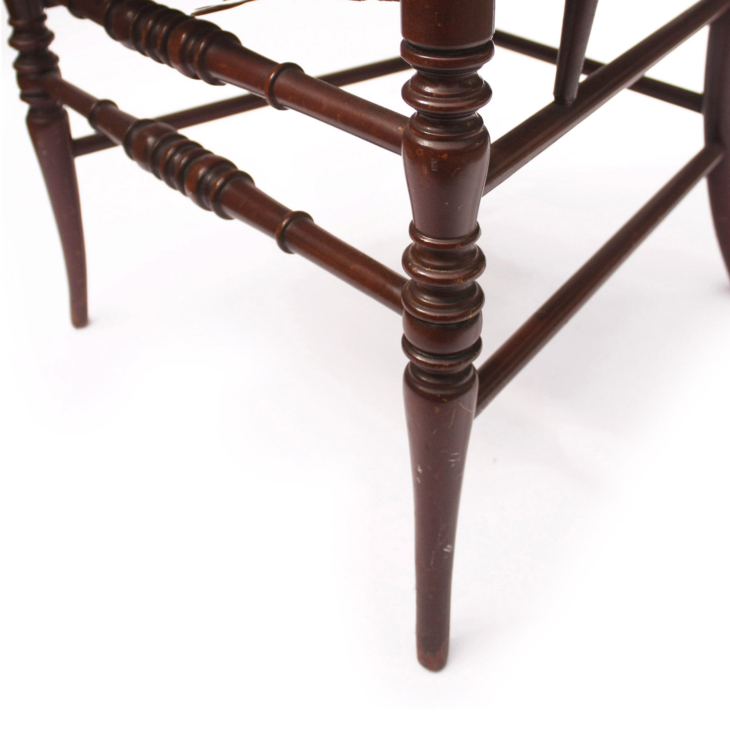 vintage spindle armchair with gingham cushion