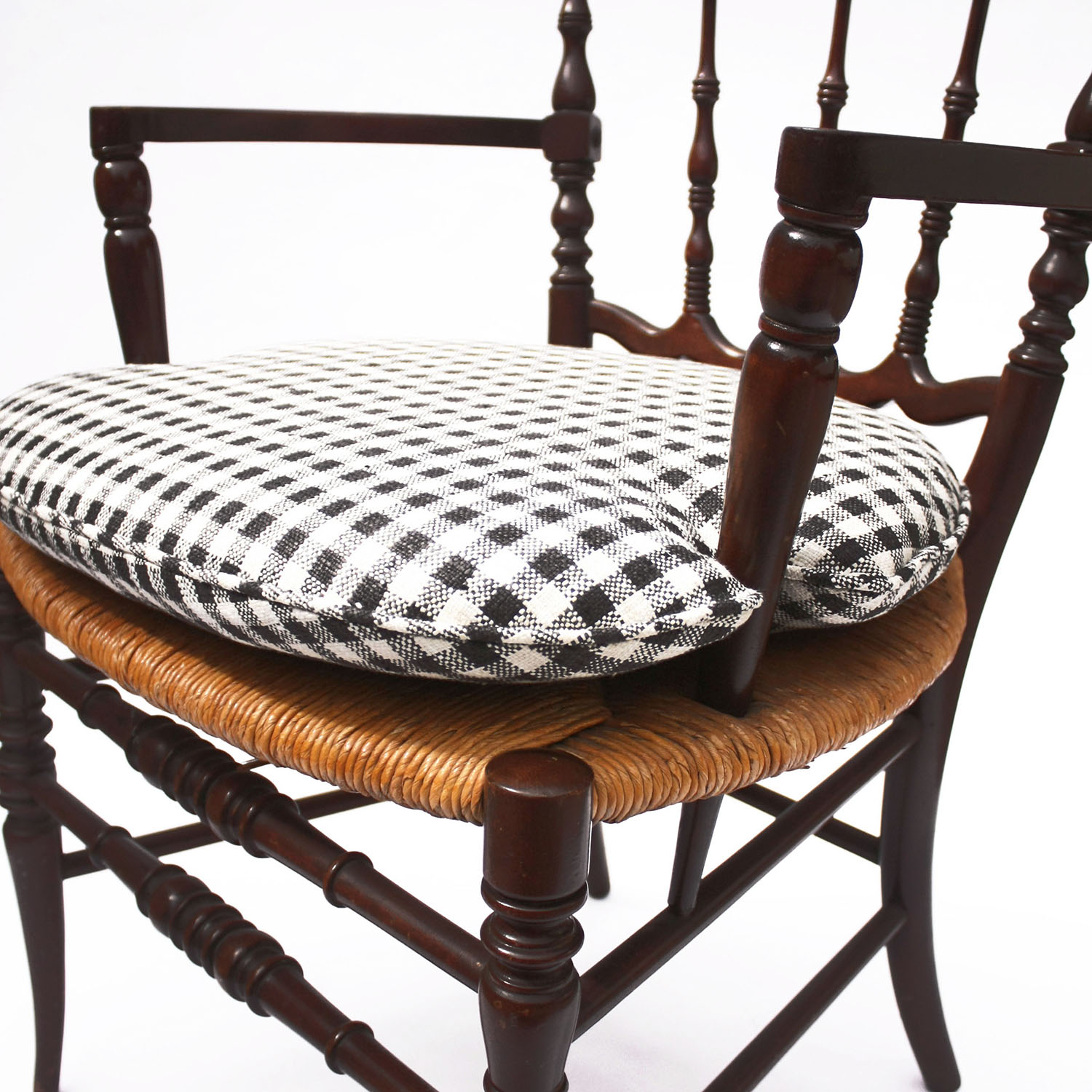 vintage spindle armchair with gingham cushion