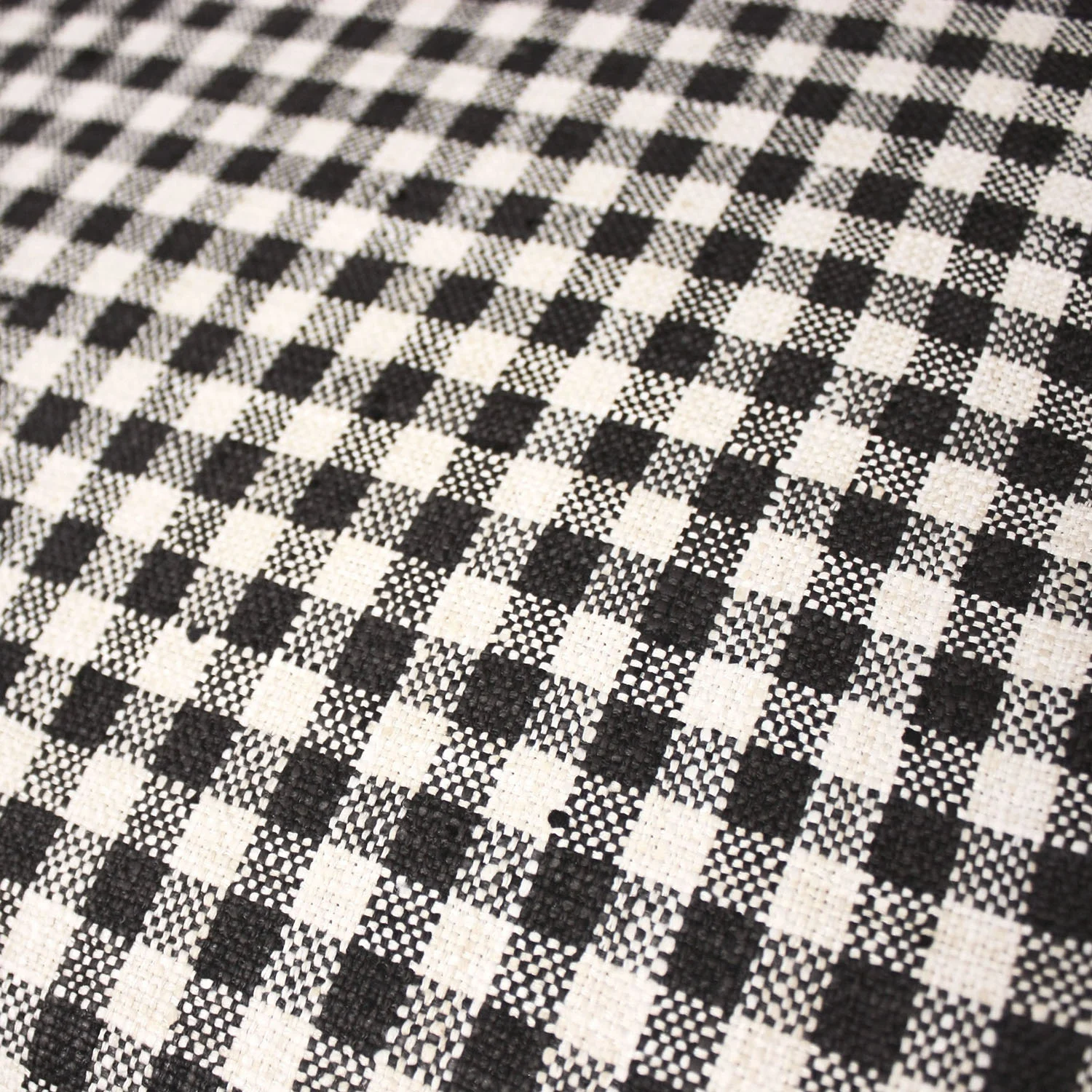 vintage spindle armchair with gingham cushion