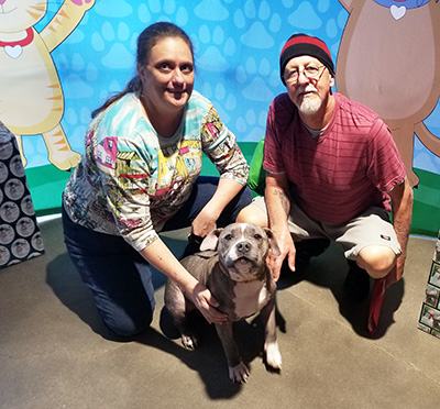Bubbles and his new family on adoption day!
