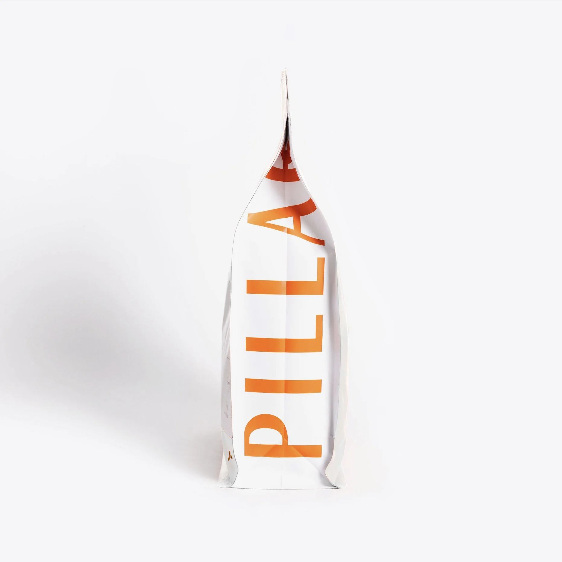 Pillar_ProductMockup-WhiteBag-Side.jpg