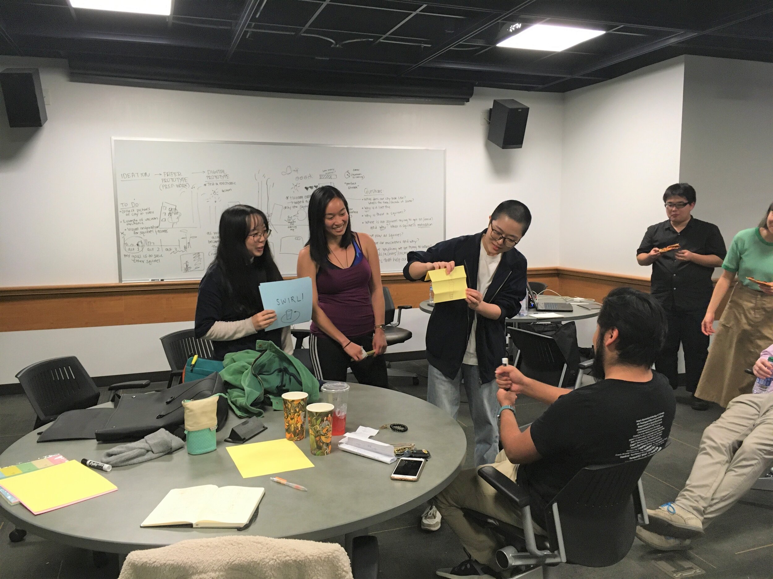  My teammates and I presenting our paper prototype to our peers and faculty. 
