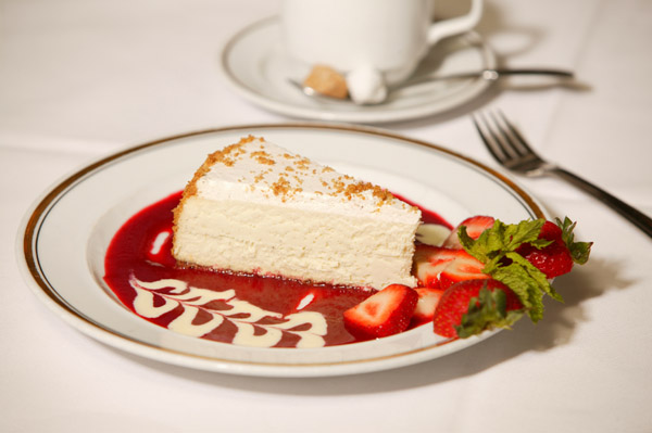 New York Cheesecake with Raspberry Sauce.