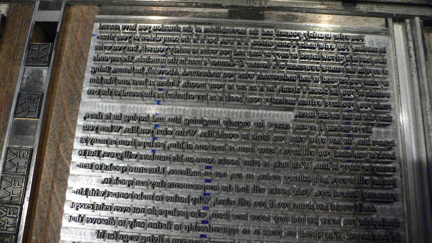 Movable type on a printing press ©2008 Nelson Pavlosky