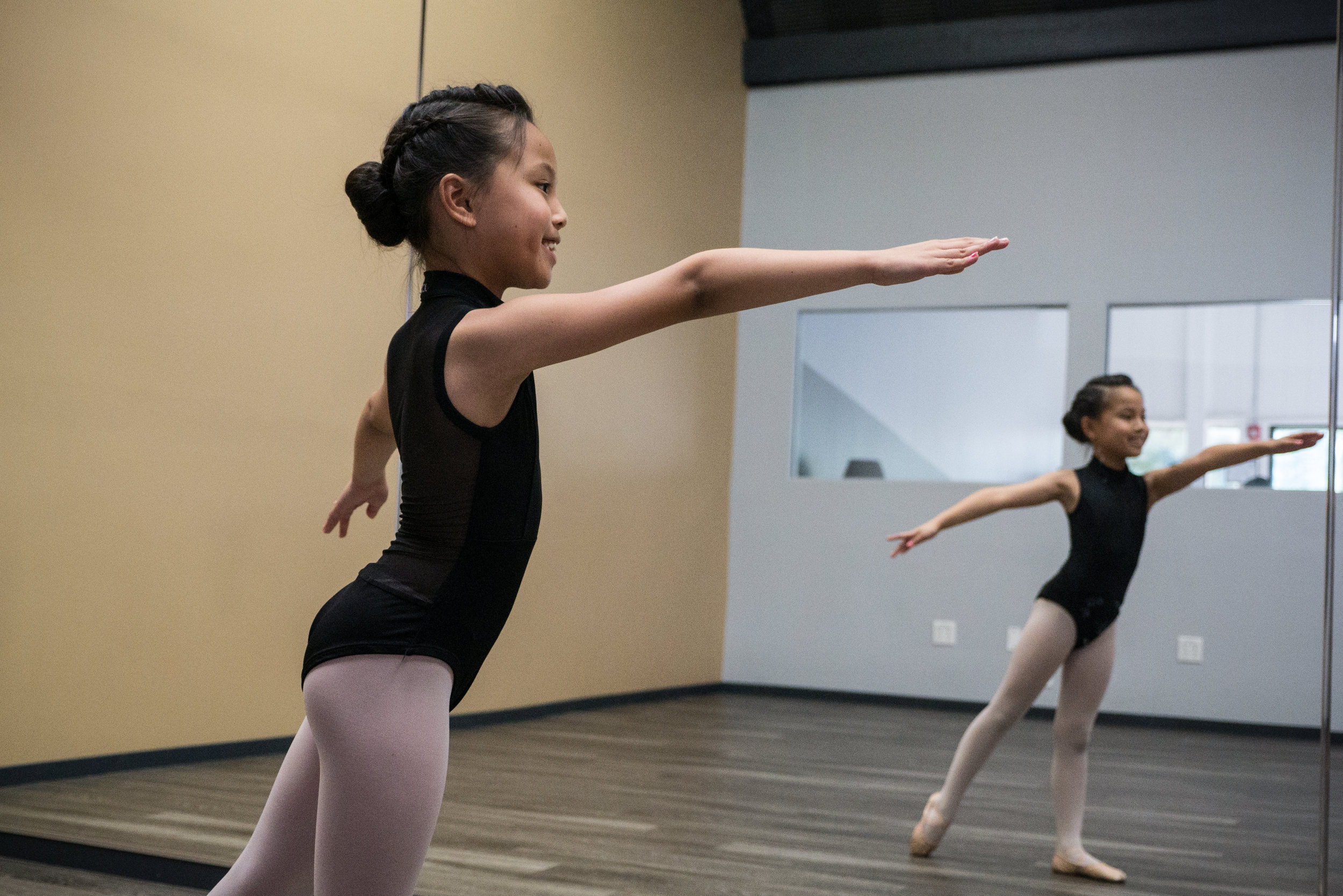 Young girl in ballet class